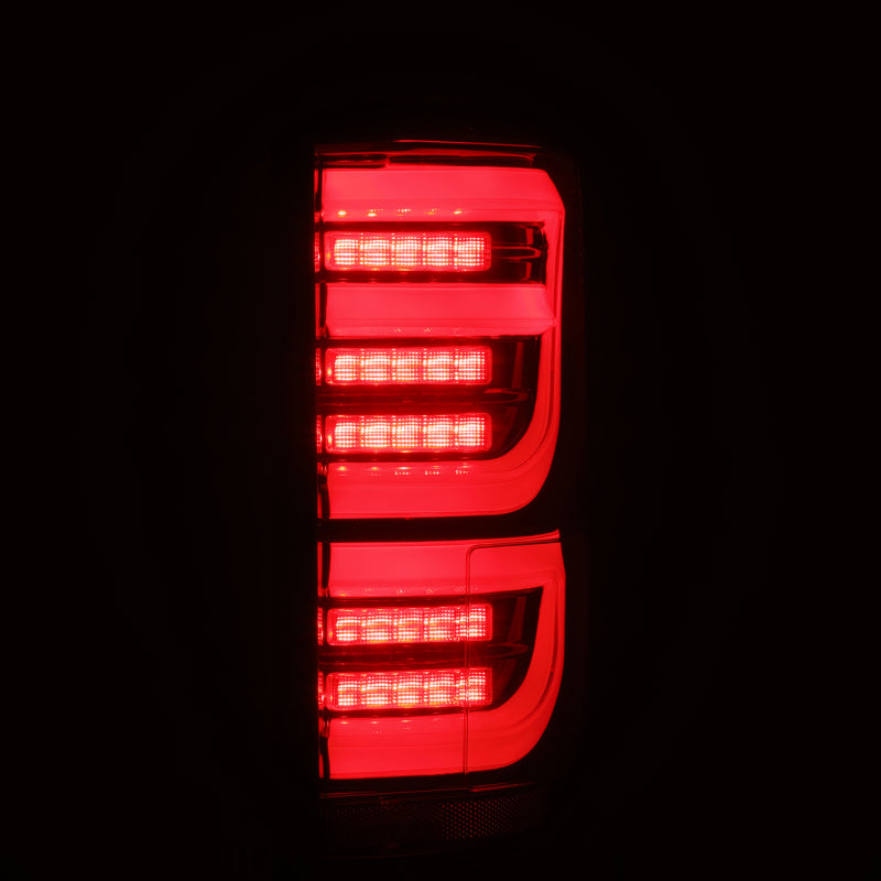 AlphaRex Luxx LED tail lights for 15-20 Ford F-150 in black and red, featuring a sleek design and bright illumination.