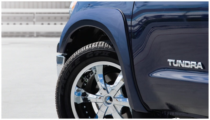 Black Bushwacker OE style flares for 2007-2013 Toyota Tundra, enhancing tire coverage and protection.