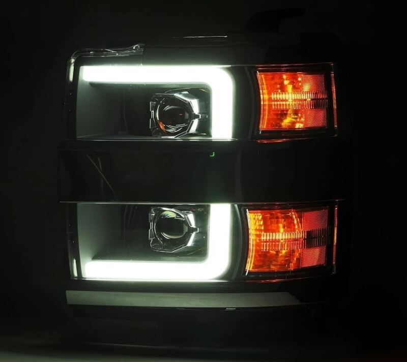 AlphaRex LUXX-Series projector headlights for 15-19 Chevy Silverado 2500/3500 with chrome finish, sequential signals, and DRL.
