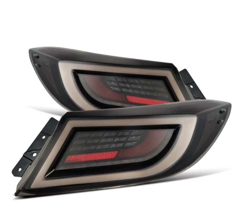 AlphaRex 22-24 Toyota GR86 LUXX LED taillights in black smoke, featuring a sleek design and enhanced visibility.
