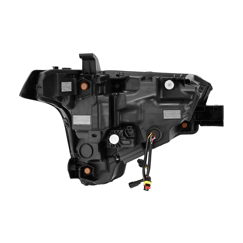 AlphaRex LUXX-Series headlights for 2022-2023 Toyota Tundra in alpha-black with amber daytime running lights.