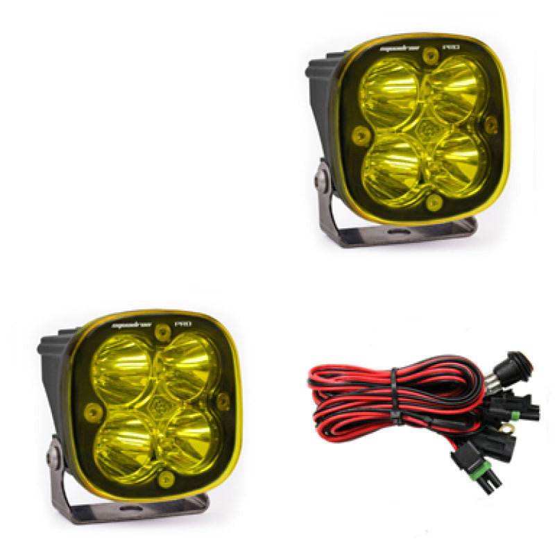 Baja Designs Squadron Pro Series amber LED light pods with spot pattern, featuring two pods and wiring harness.