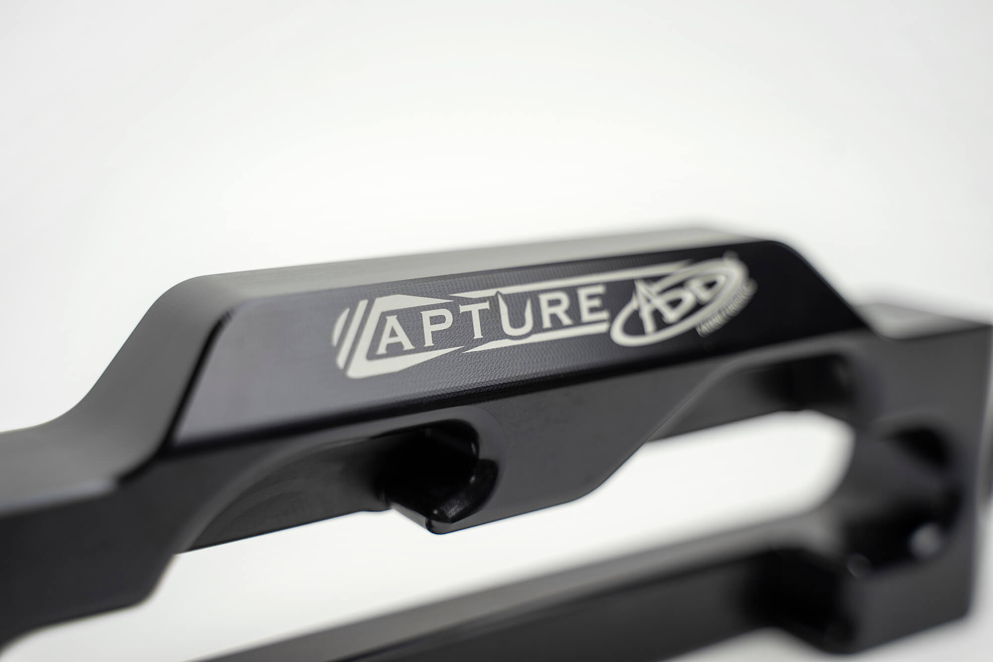 ADD Capture Fairlead in black, featuring a sleek design and engraved logo, ideal for offroad vehicle winching applications.