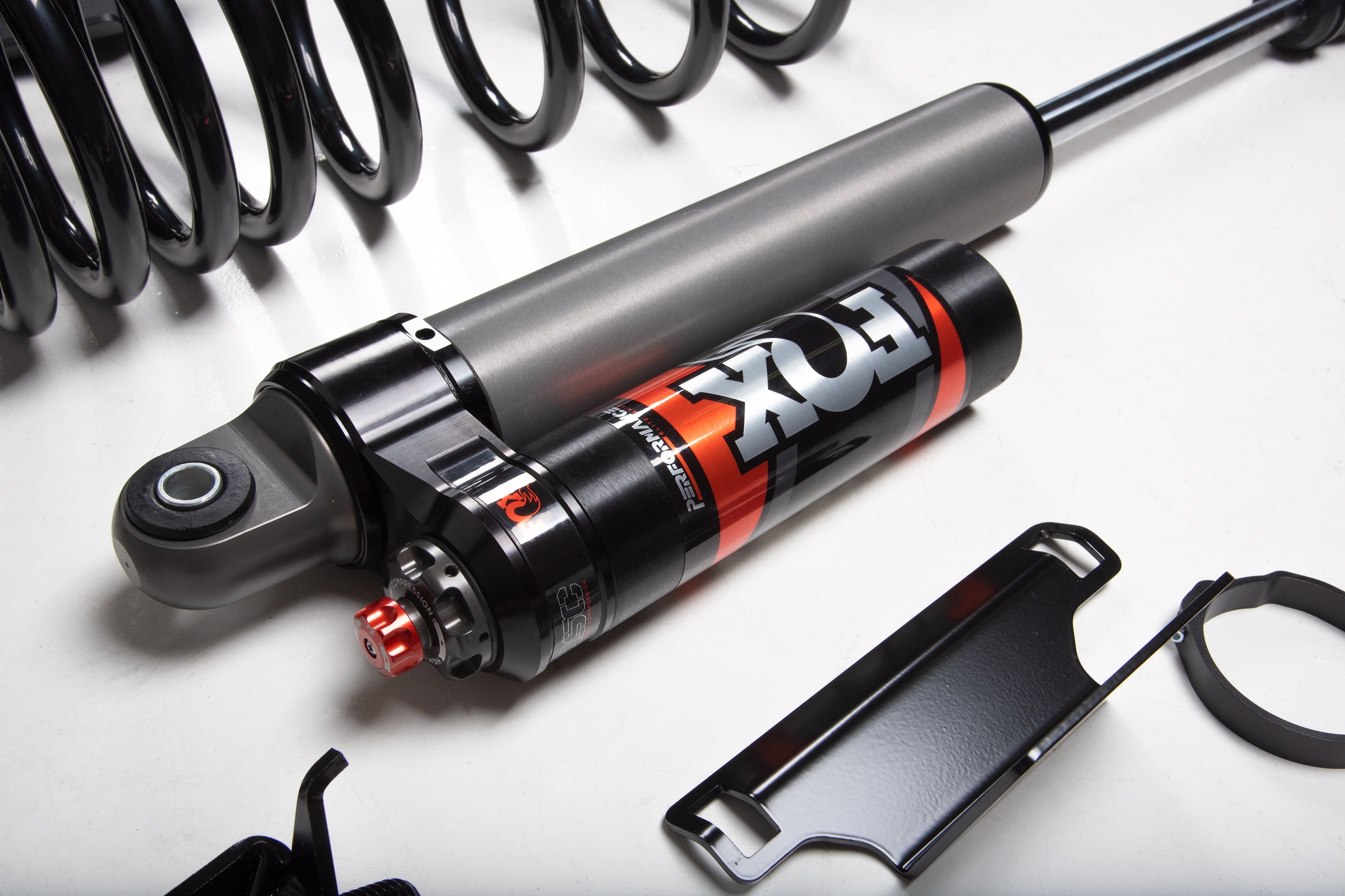 5 inch lift kit components for Toyota Tundra 4WD, featuring shock absorber and coil spring for enhanced off-road performance.