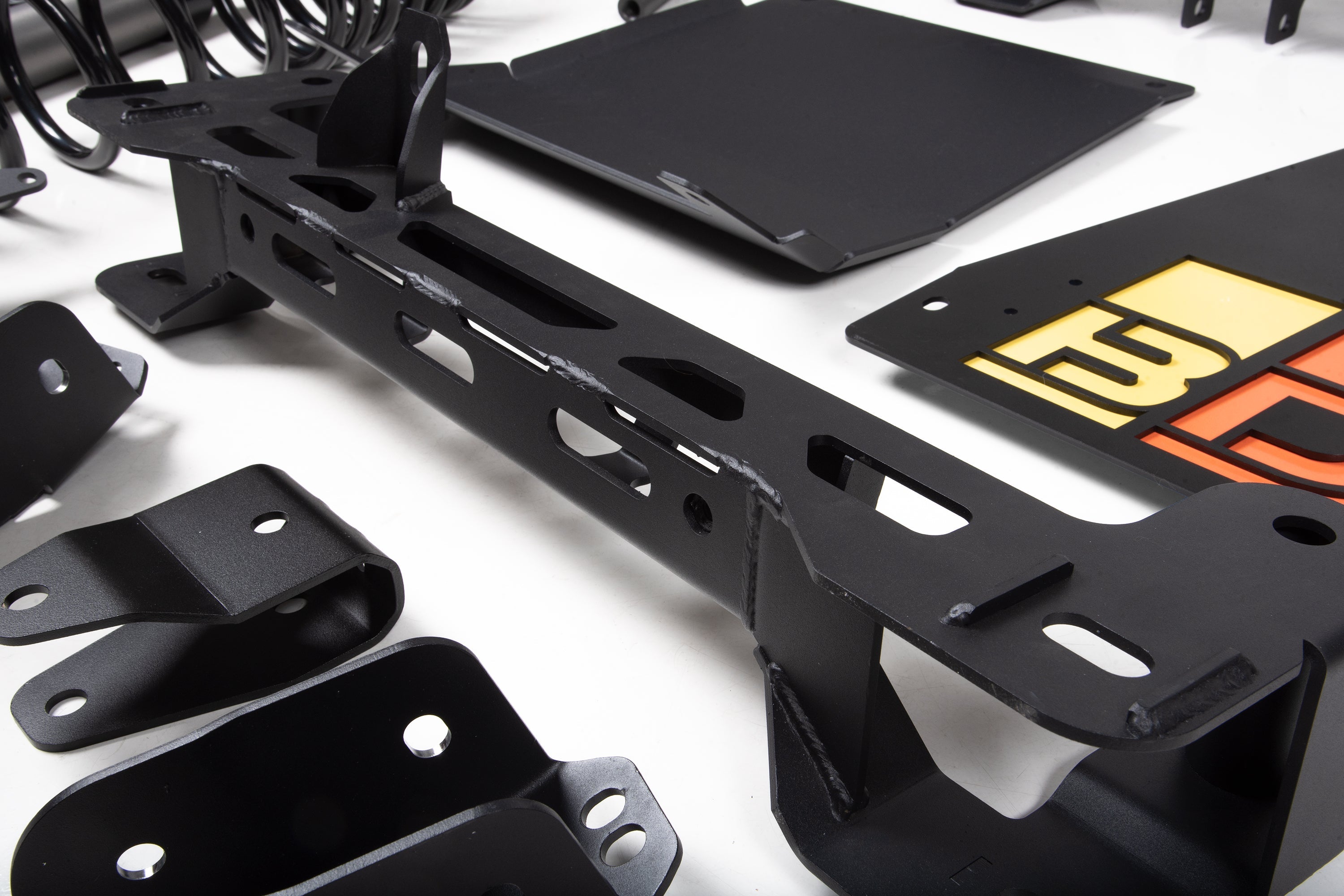 5-inch lift kit components for 2022-2025 Toyota Tundra 4WD, showcasing durable black metal parts and brackets.