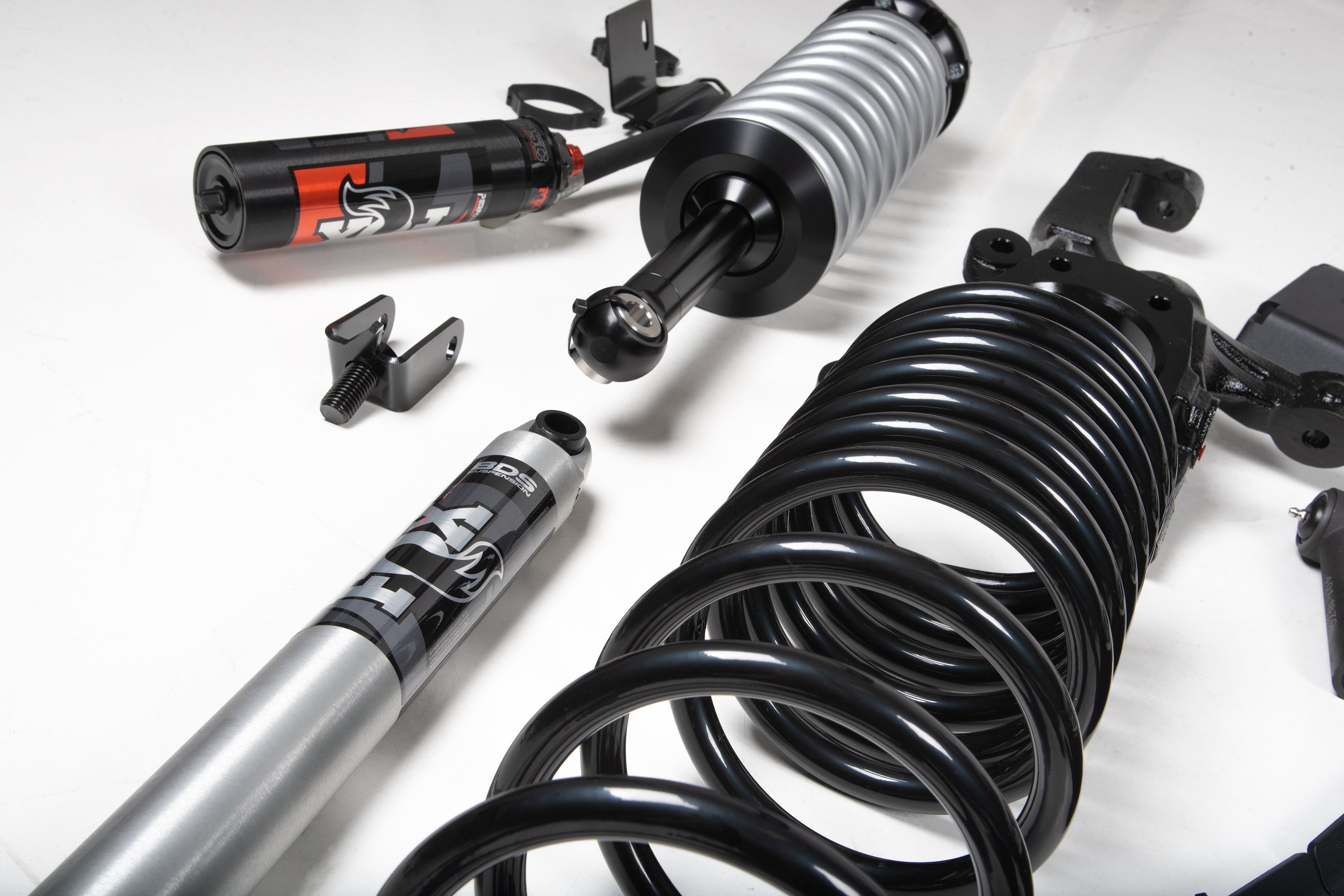 5 inch lift kit components for Toyota Tundra 4WD, featuring shocks, coils, and installation hardware for enhanced off-road performance.