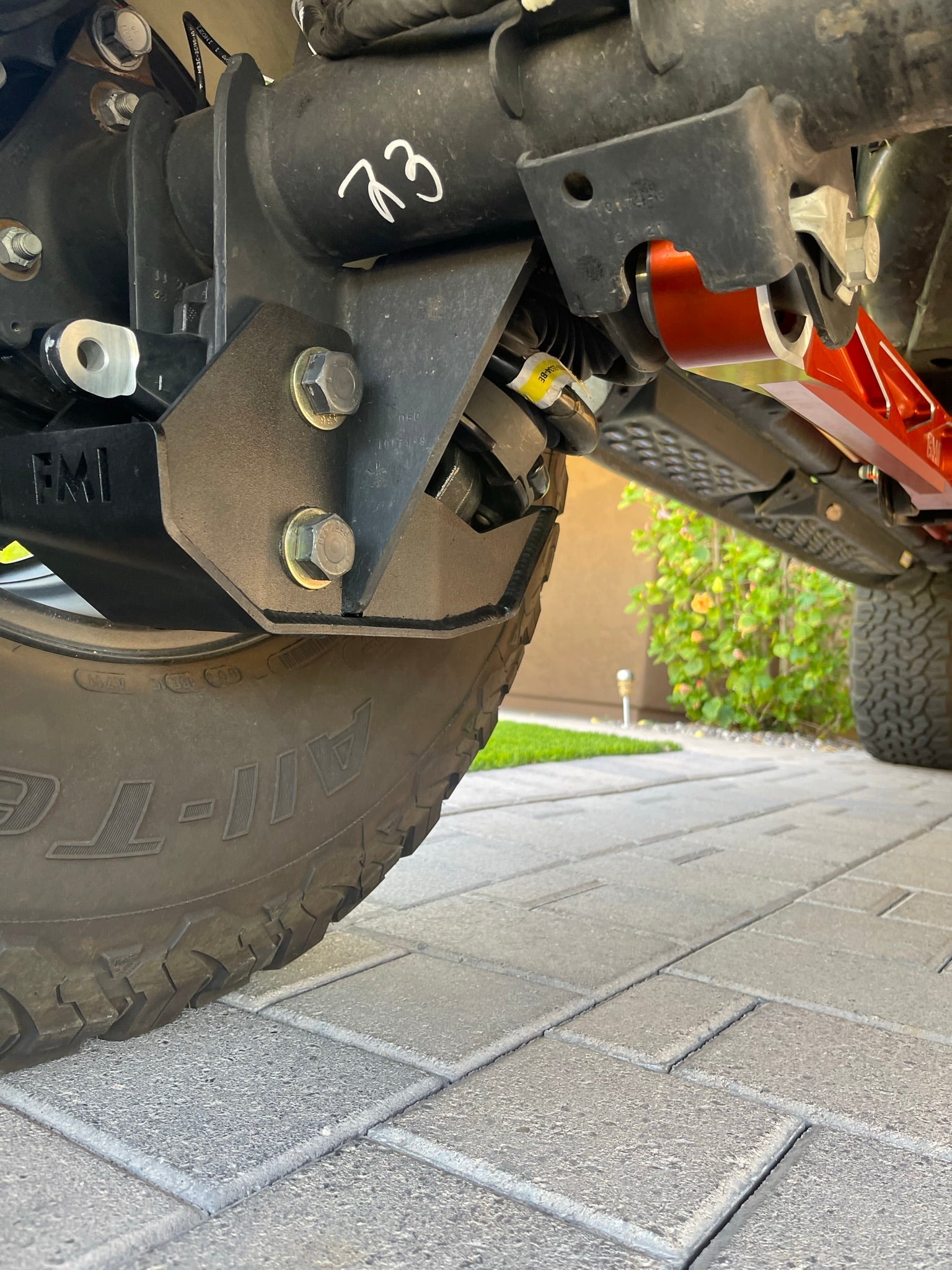 2022 and newer Bronco Raptor rear shock skid kit installed, showcasing durable protection and robust design under the vehicle.