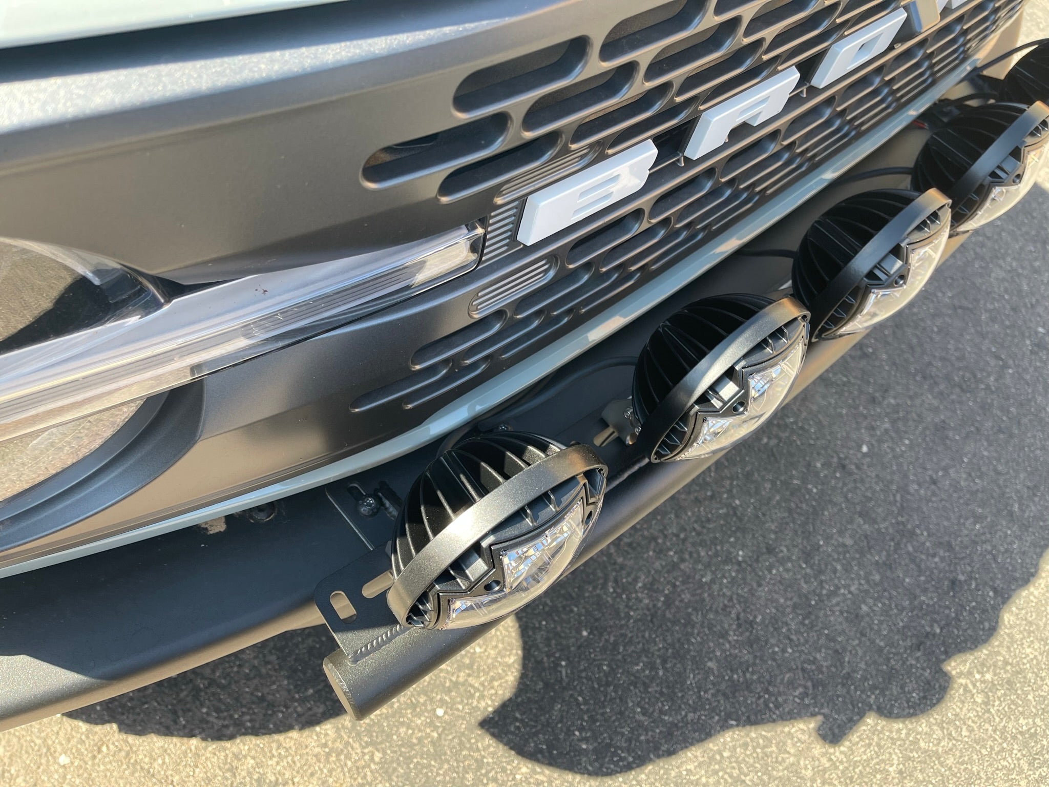 Front light mount kit for 6th Gen Bronco's modular stock bumper, designed for versatile light installation.