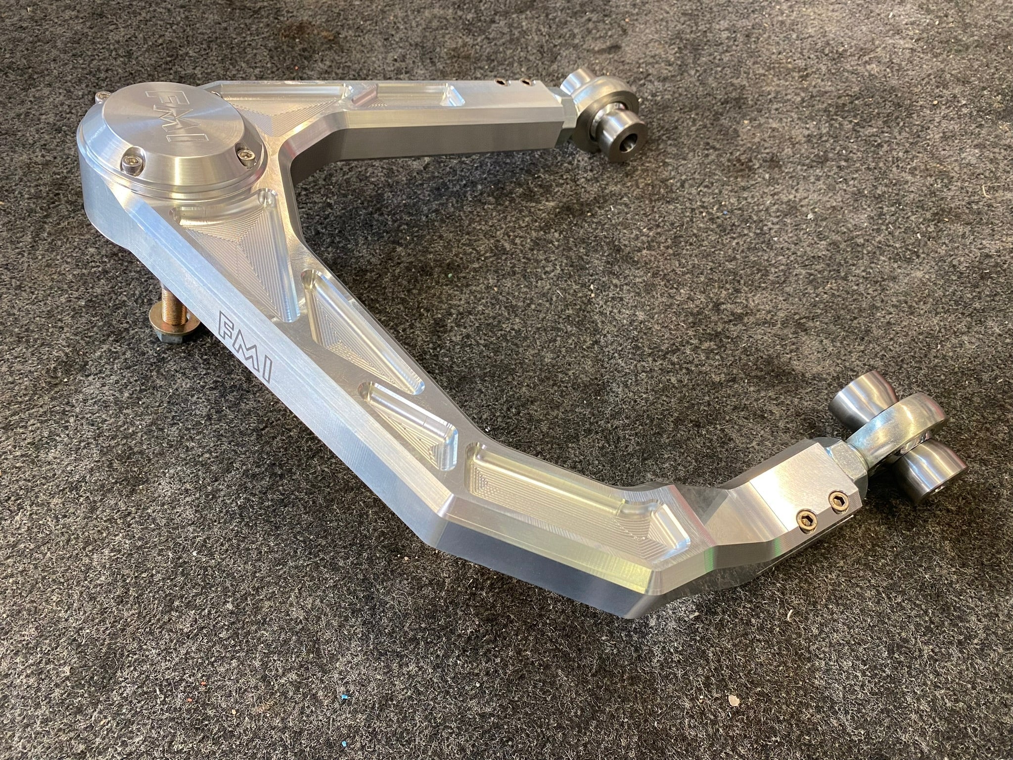 Bronco Raptor billet upper arm kit in stock length, showcasing a polished aluminum finish and precision engineering.