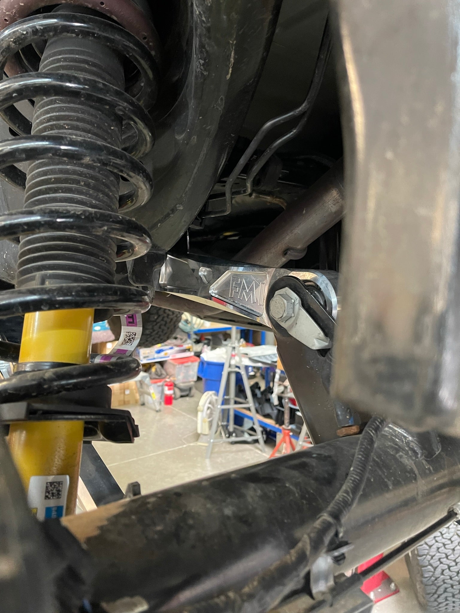 Bronco rear suspension kit featuring billet aluminum rear arms, showcasing quality construction and performance enhancement.