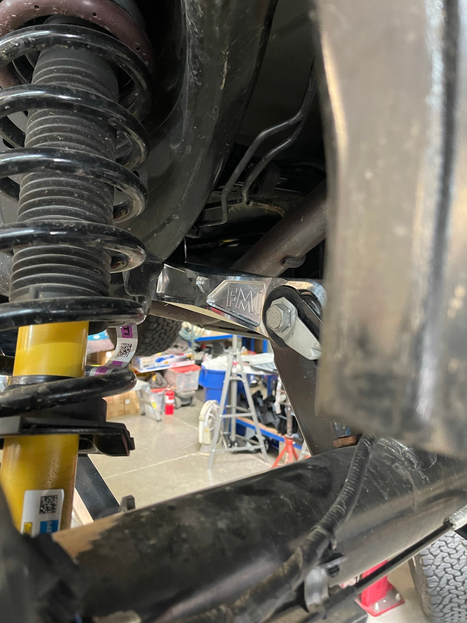 Bronco rear suspension kit featuring billet aluminum rear arms, showcasing durable construction and performance enhancement.