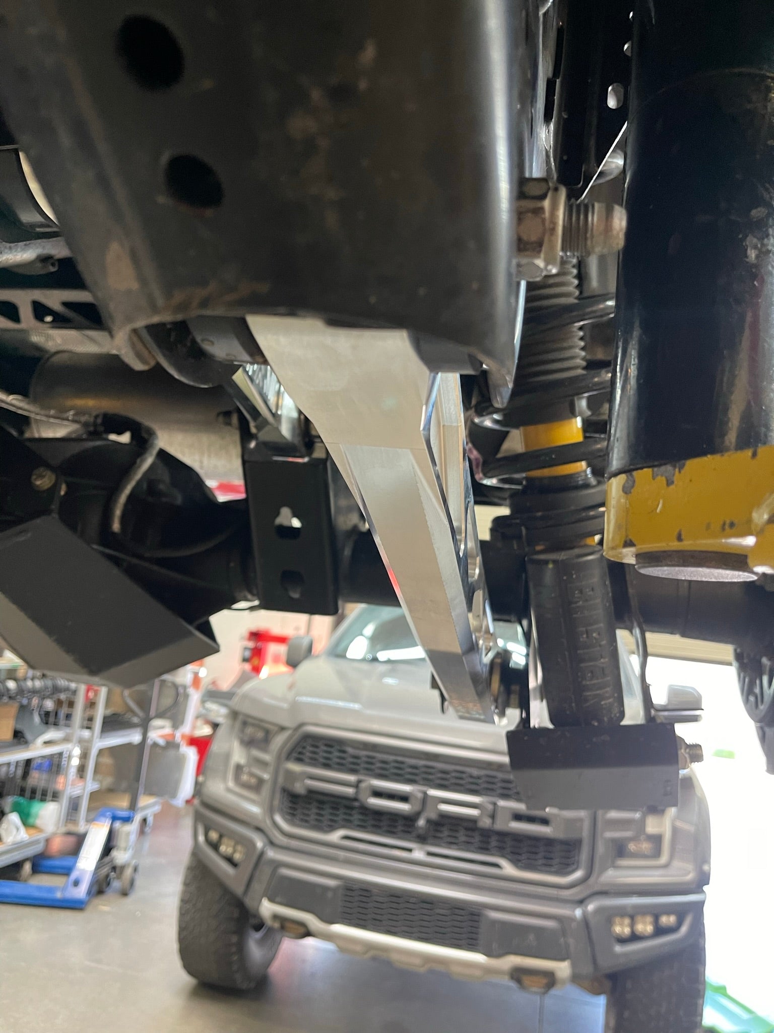 Bronco rear suspension kit featuring billet aluminum rear arms installed, showcasing durability and performance enhancements.