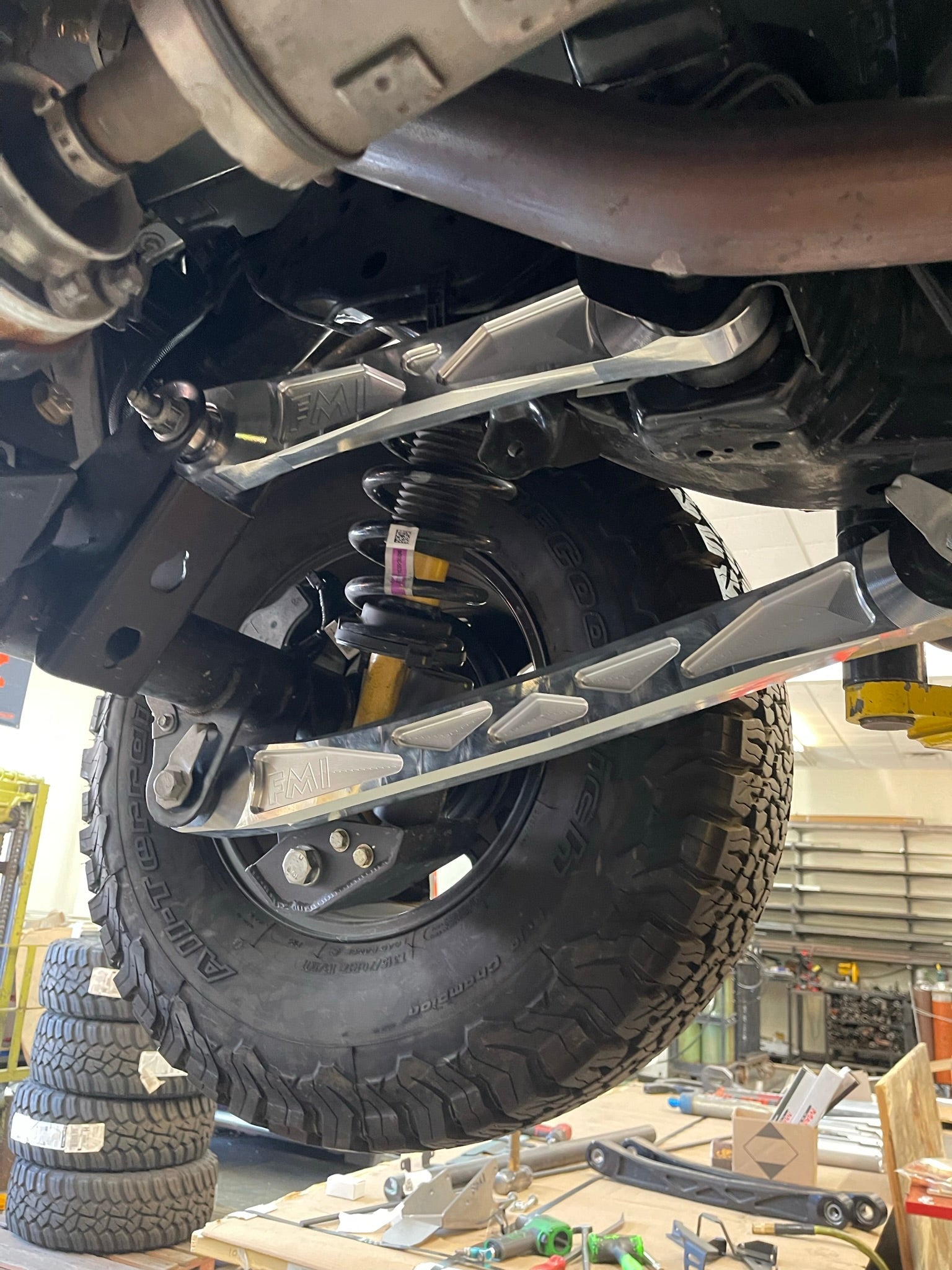 Bronco rear suspension kit featuring billet aluminum rear arms, showcasing durability and performance enhancement.