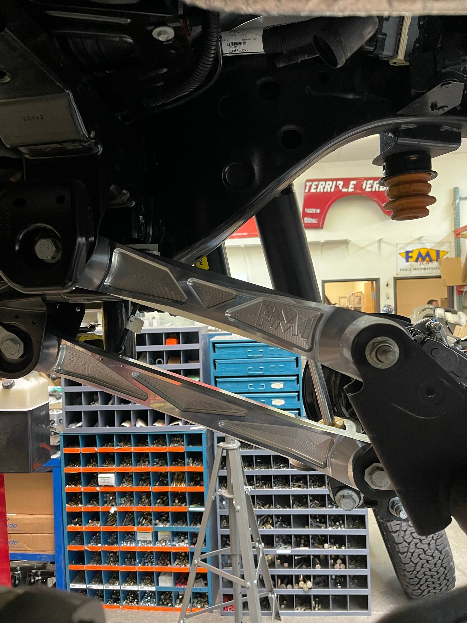 Bronco Raptor rear suspension kit featuring billet aluminum rear arms, showcasing durable construction for offroad performance.