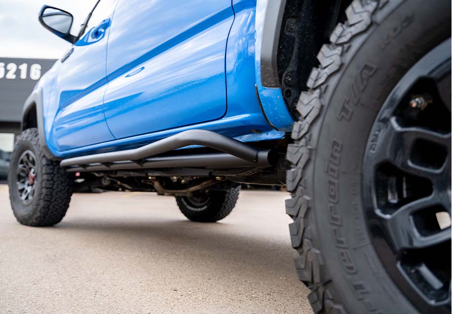 Trail Edition Rock Sliders Fits 24-Present Toyota Tacoma - Double Cab Long Bed/Kick Out/Raw Cali Raised LED