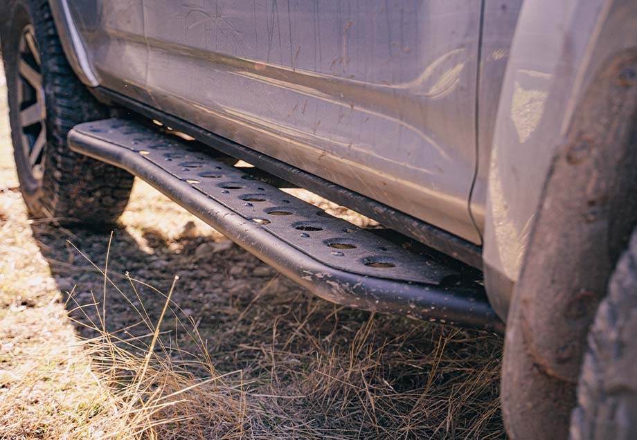 Step Edition Rock Slider For 24-Present Toyota Tacoma/Double Cab Short Bed W/ No Kick Out/Yes (Bed Liner)/Powdercoat Cali Raised LED