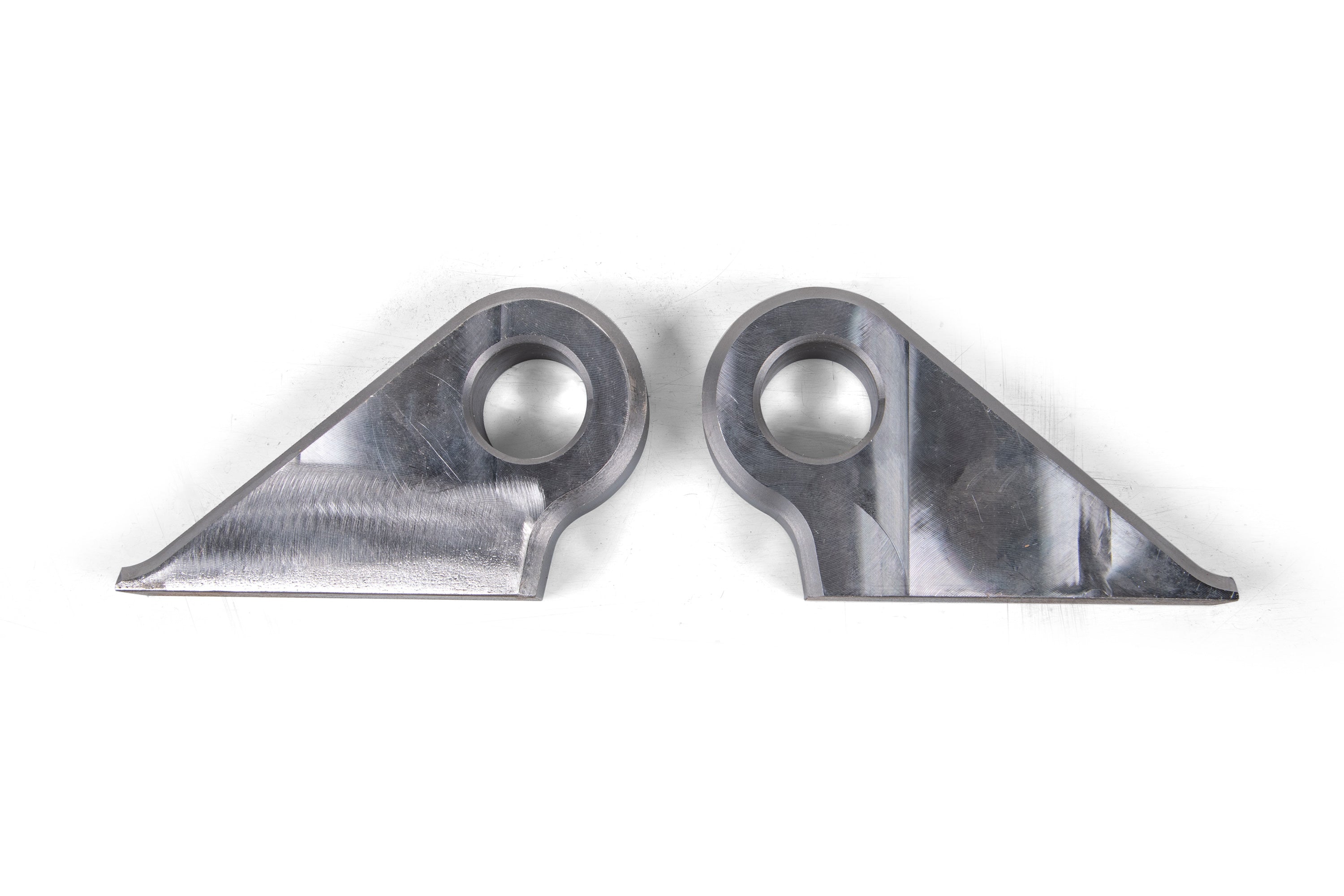 CNC machined 1-inch shackle tabs in a pair, designed for durable offroad vehicle suspension upgrades.