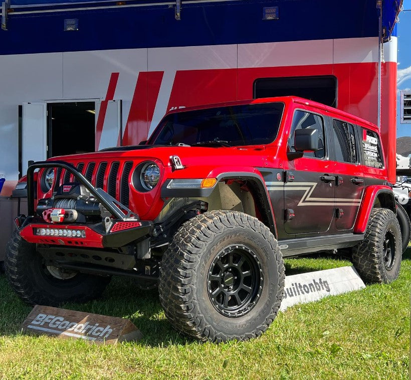 Blaze Front Bumper for Jeep Wrangler JL and Gladiator JT displayed on a modified red Jeep with offroad tires.