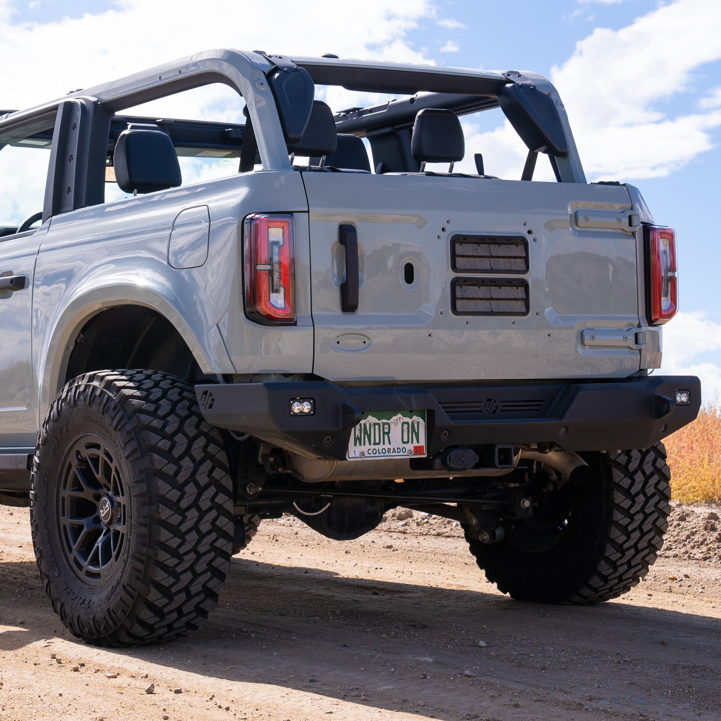 2021-2025 Ford Bronco 2-Door Rear Quarter Kit installed on a gray Bronco showcasing rugged off-road design and features.