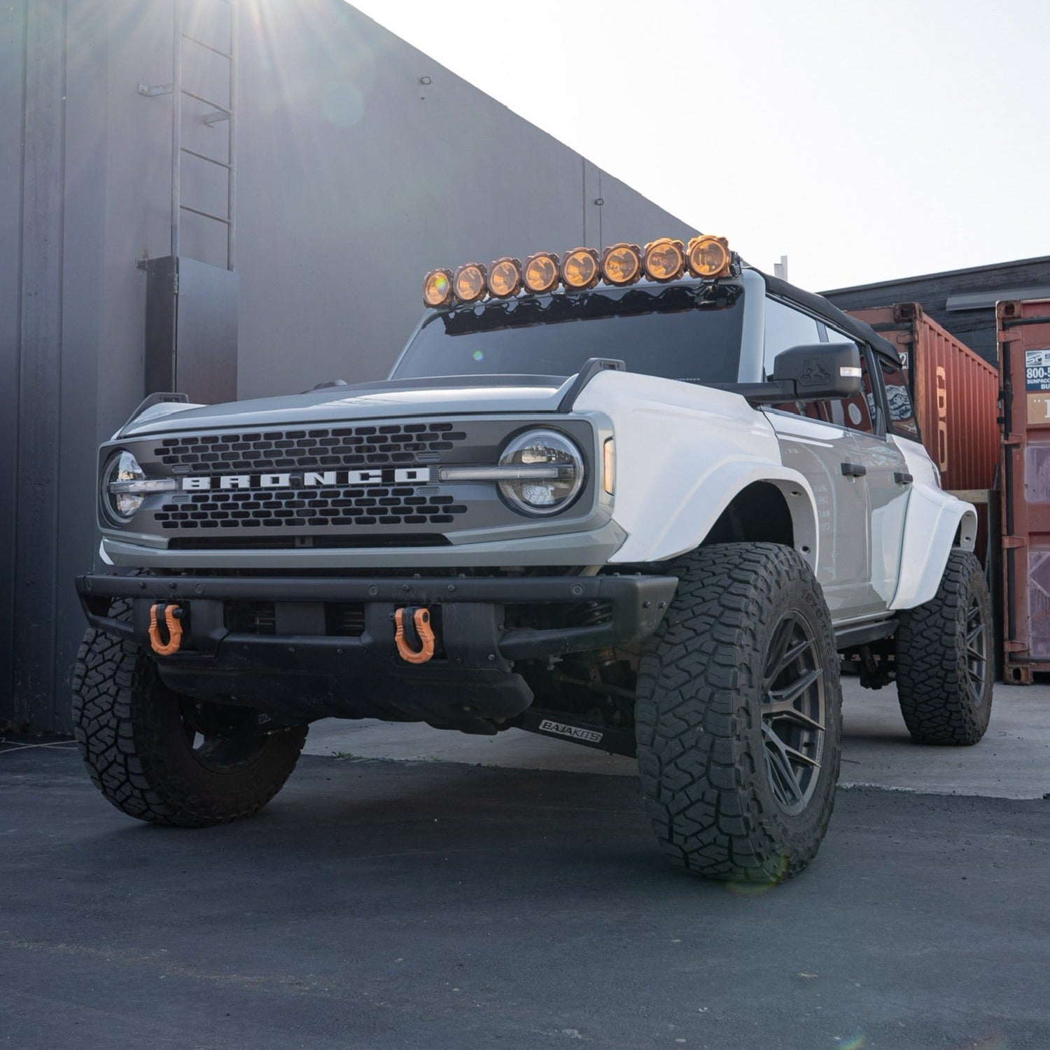 2021-2025 Ford Bronco with upgraded fenders, showcasing a rugged design and off-road capabilities in a modern setting.