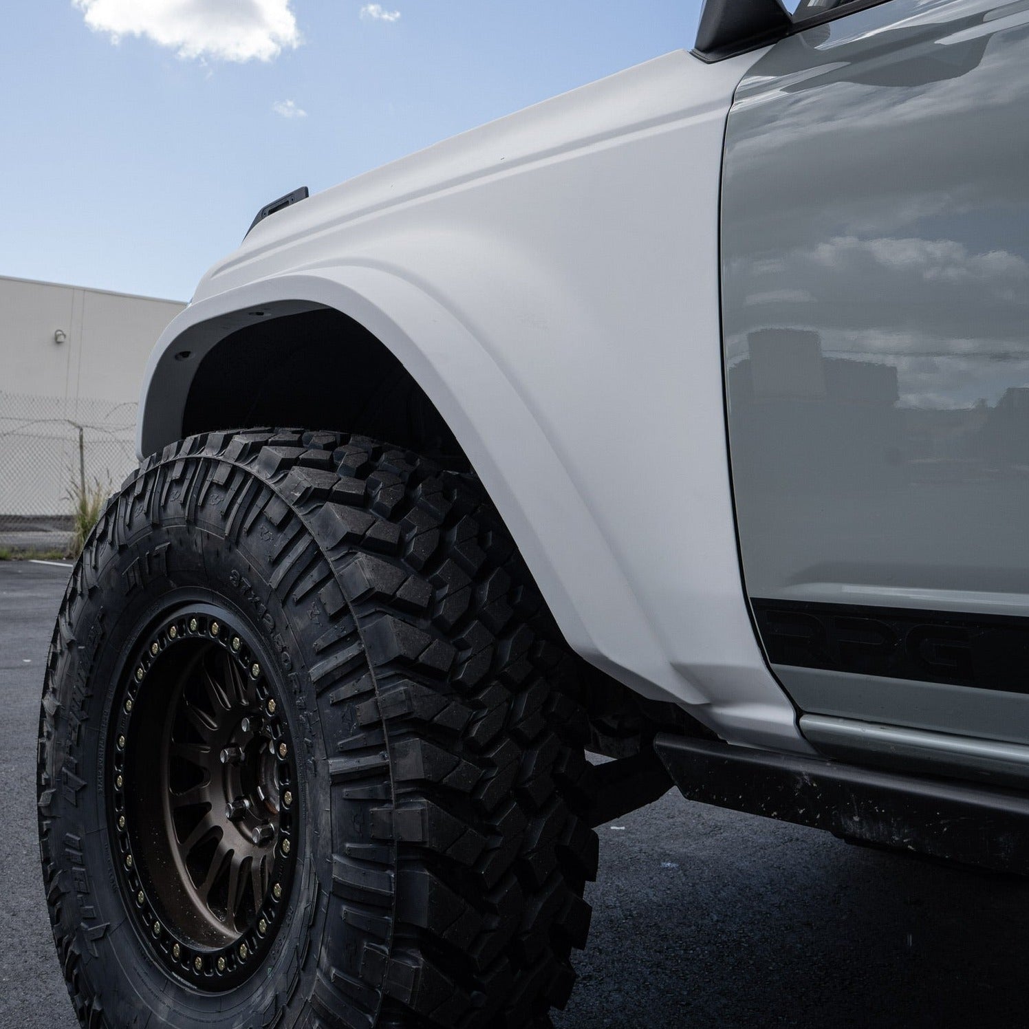 2021-2025 Ford Bronco fenders showcasing a rugged design and fitment on a modified vehicle with off-road tires.
