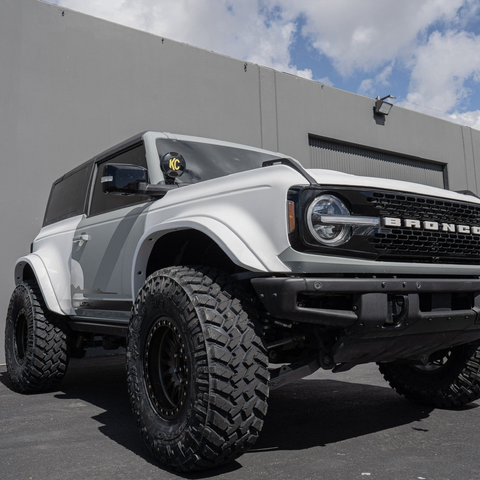 2021-2025 Ford Bronco 2-Door Rear Quarter Kit displayed on a modified Bronco with offroad tires and custom wheels.