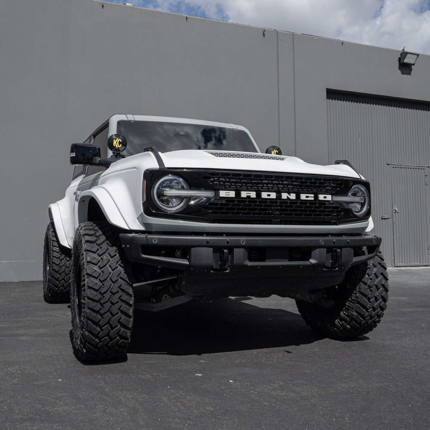 2021-2025 Ford Bronco 2-Door Rear Quarter Kit displayed on a modified white Bronco with offroad tires.