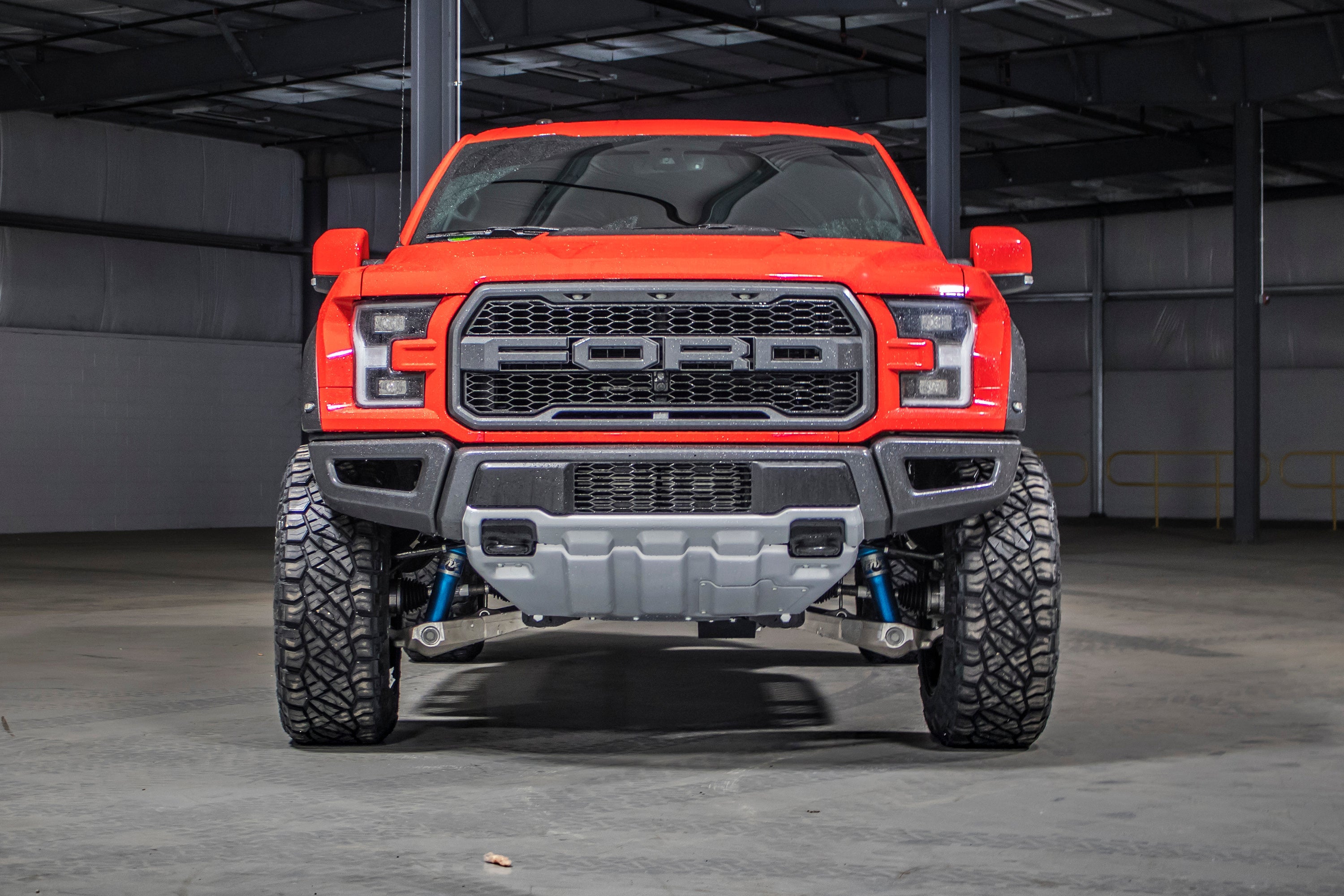 4-inch lift kit for 2019-2020 Ford F150 Raptor 4WD, showcasing enhanced off-road capability and aggressive stance.
