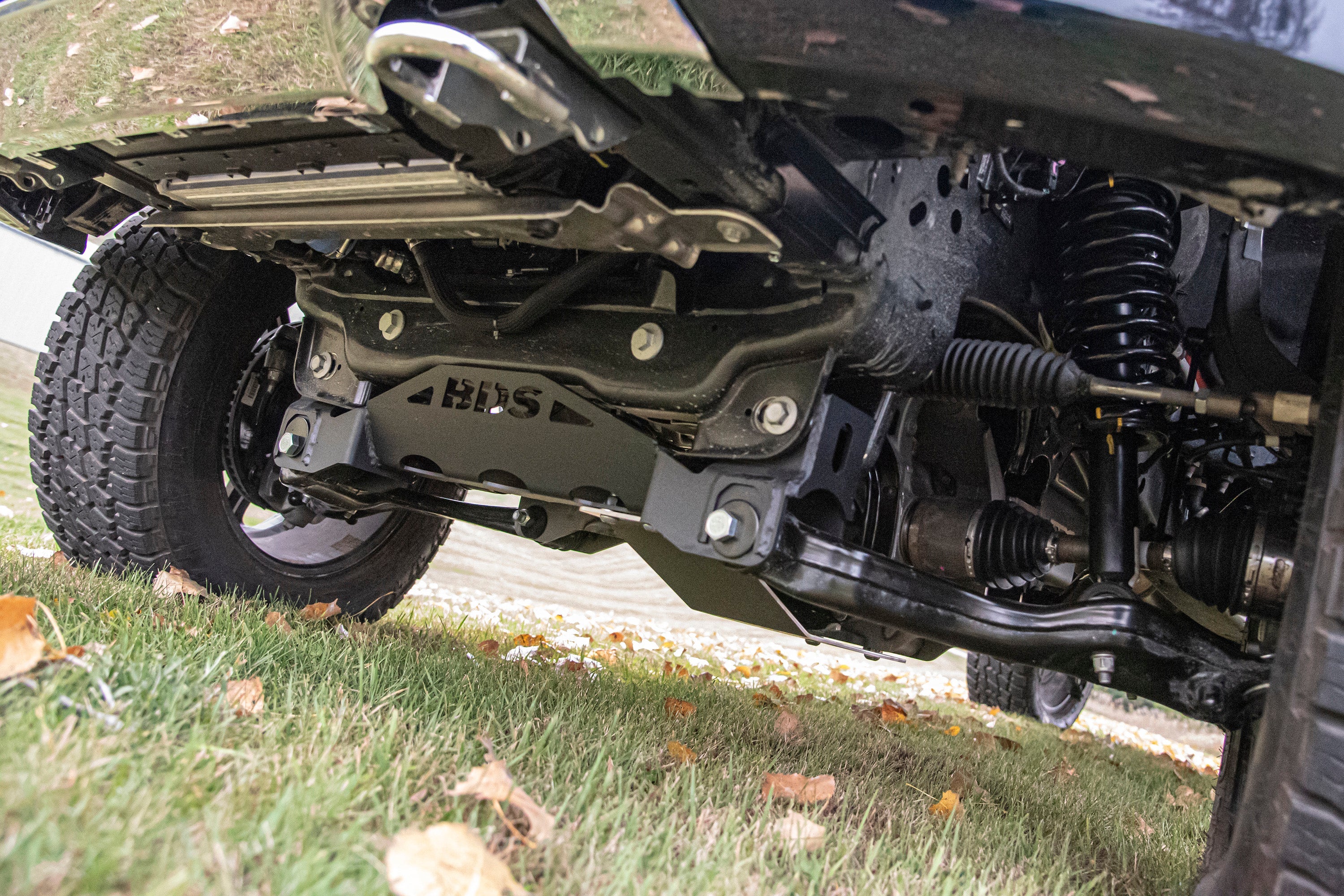 4-inch lift kit for Ford F150 4WD (2021-2025) showcasing undercarriage components and enhanced suspension system.
