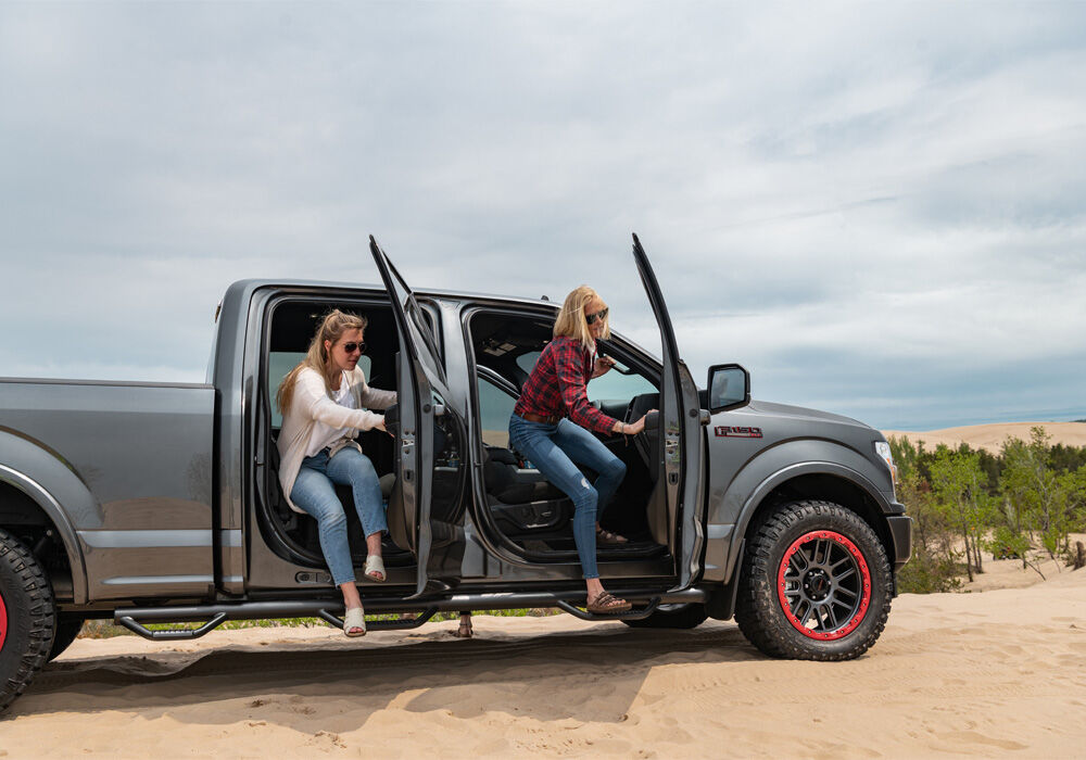 Nerf Step Bar Wheel-to-Wheel with Bed Access (3 Steps per Side) 3 Inch Main Tube Diameter 2017-2025 Ford F-250/F-350 8 Foot Bed Crew Cab with Single Rear Wheels Textured Black NFab