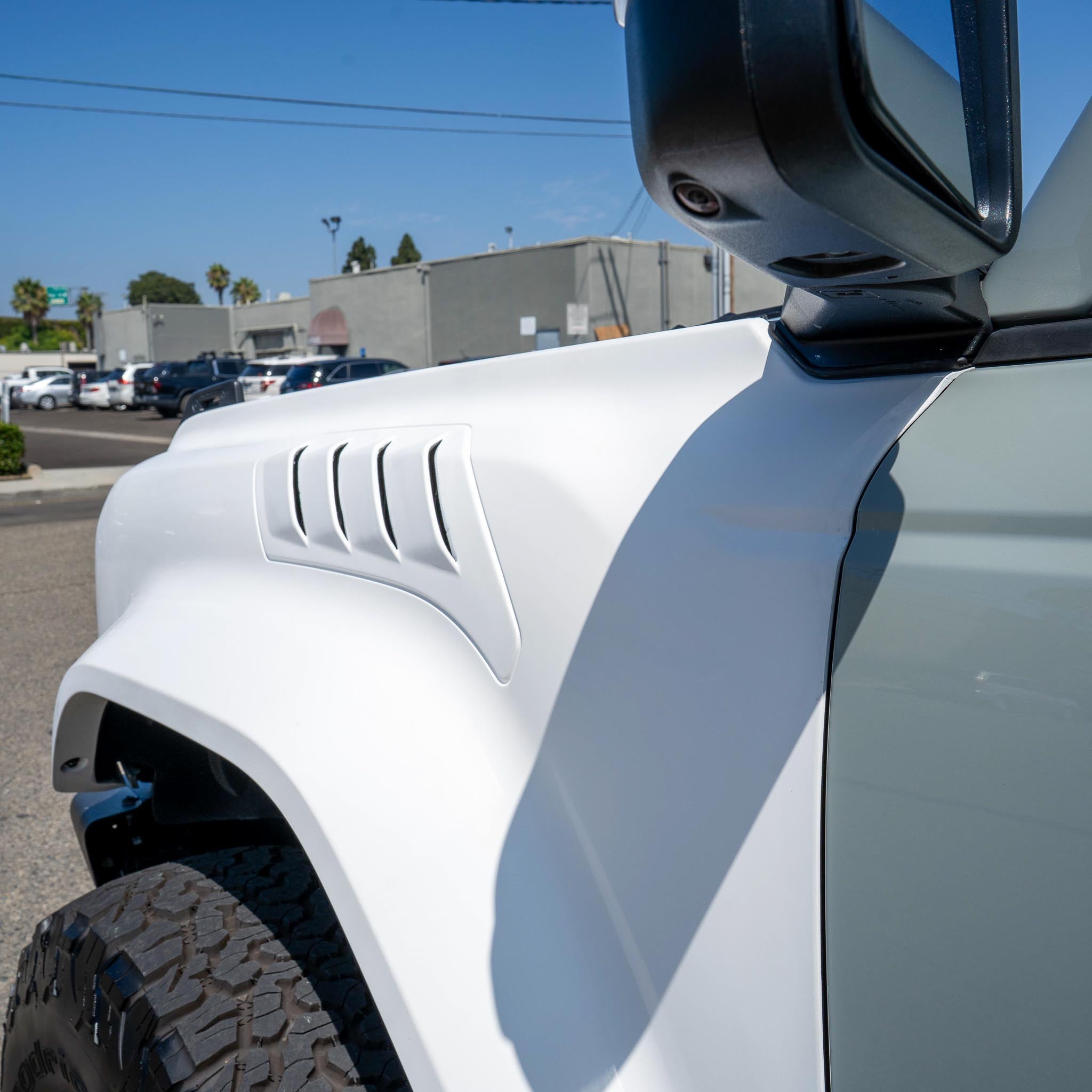 2022-2025 Ford Bronco Raptor fenders showcasing a sleek design with functional vents for enhanced performance.