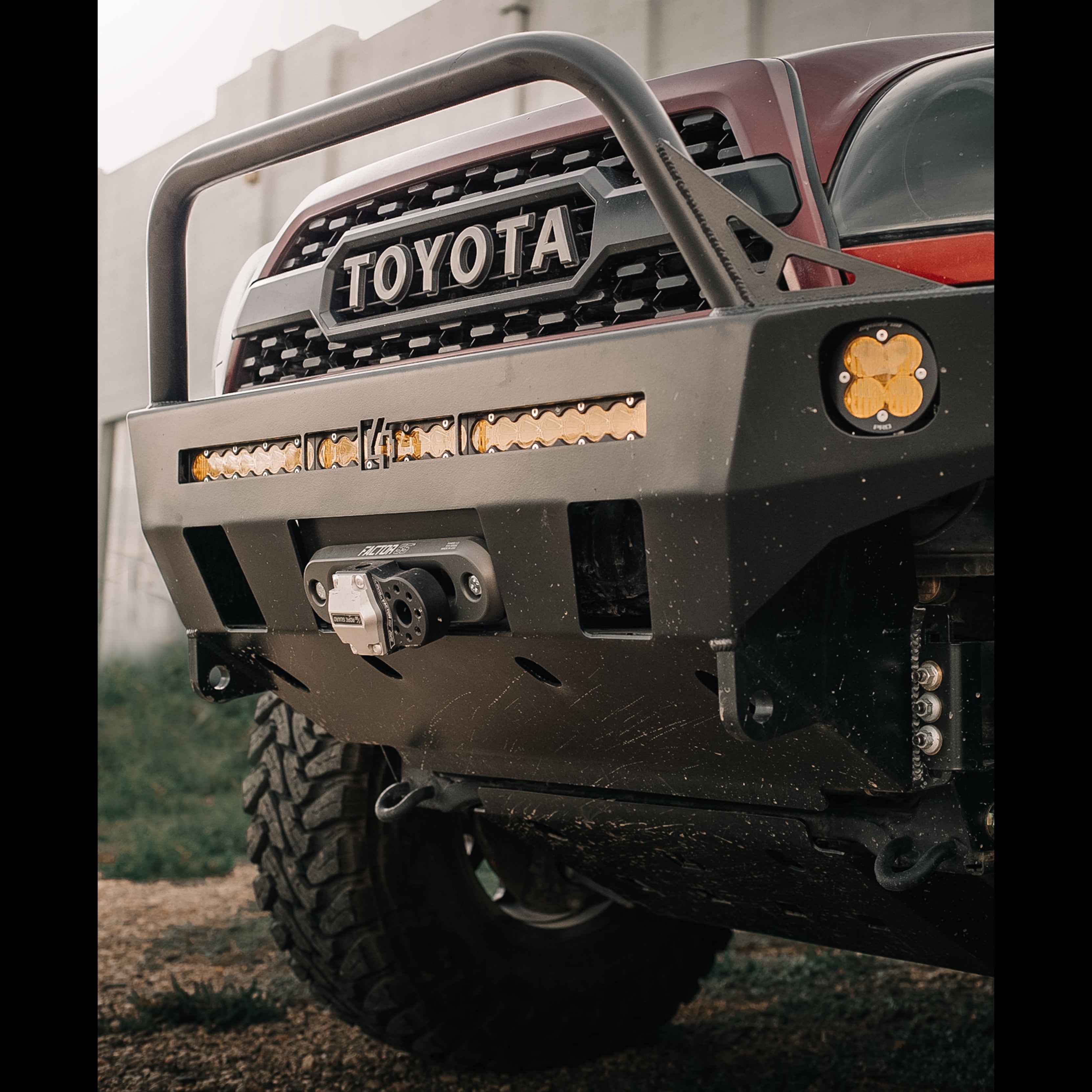 4Runner Overland Series front bumper for 2003-2009 models, featuring winch mount and integrated lighting. Ideal for off-road adventures.