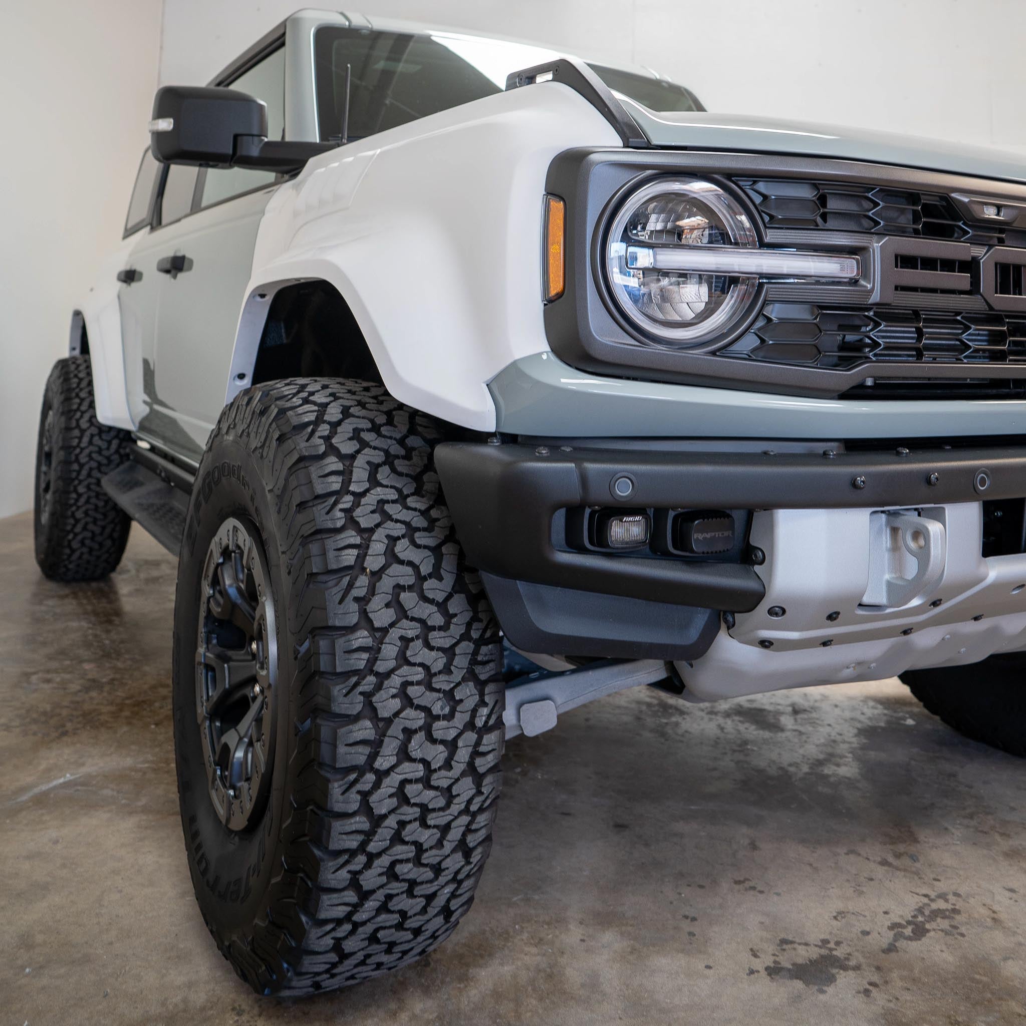 2022-2025 Ford Bronco Raptor fenders showcasing rugged design and enhanced off-road capability with aggressive tires.
