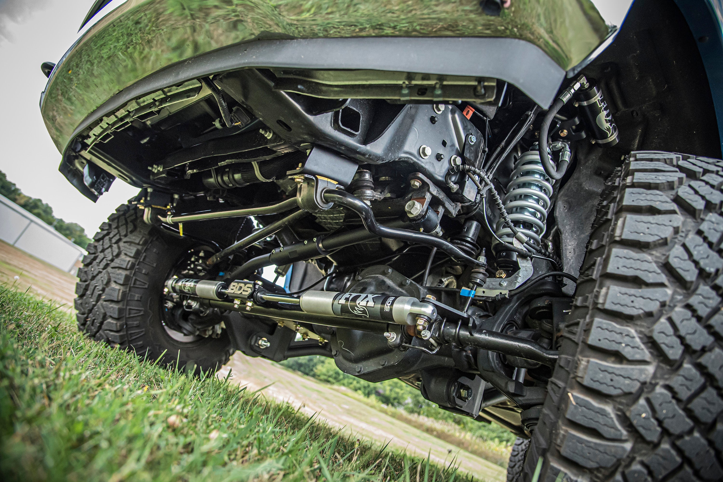 3 inch lift kit with radius arm and FOX 2.5 coil-over conversion installed on a Ford F250/F350 Super Duty 4WD.