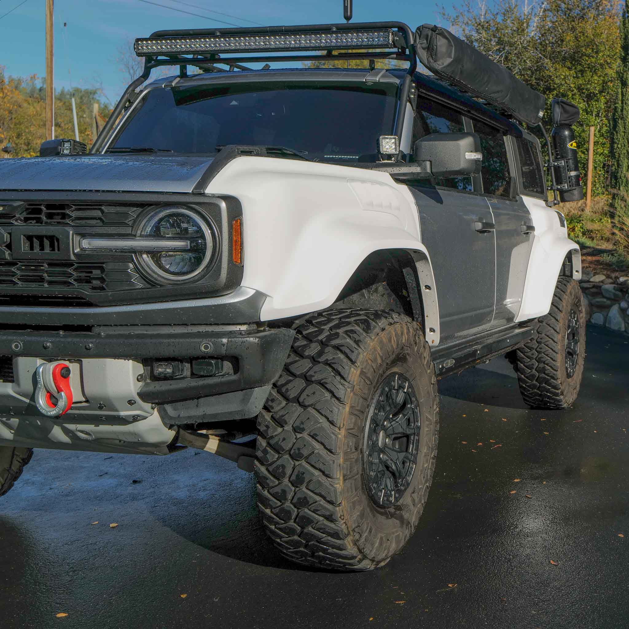 2022-2025 Ford Bronco Raptor fenders on a modified off-road vehicle showcasing rugged design and enhanced performance.