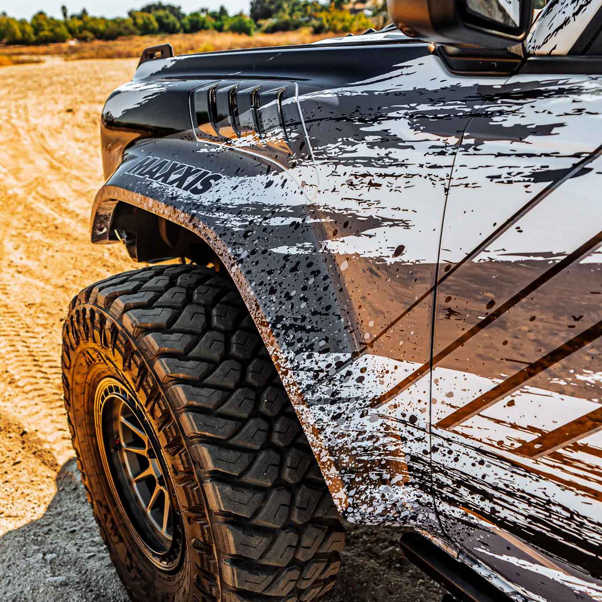 2022-2025 Ford Bronco Raptor fenders showcasing rugged design and off-road capability with aggressive tire tread.