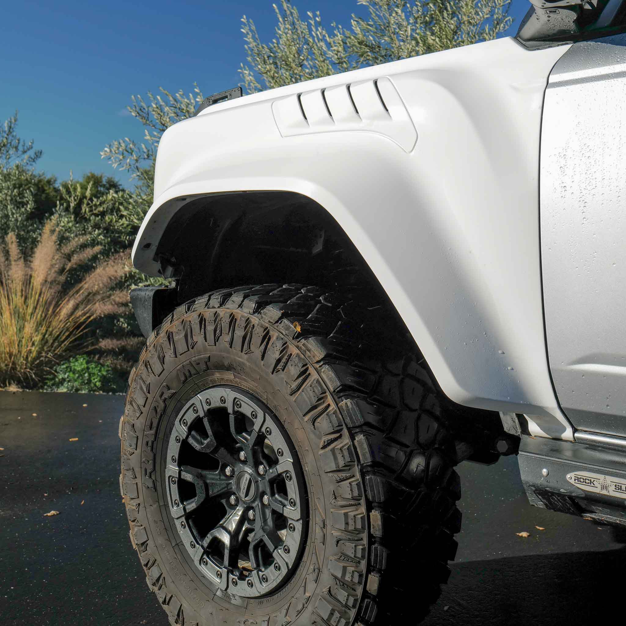 2022-2025 Ford Bronco Raptor fender showcasing rugged design and durable construction, paired with an off-road tire.