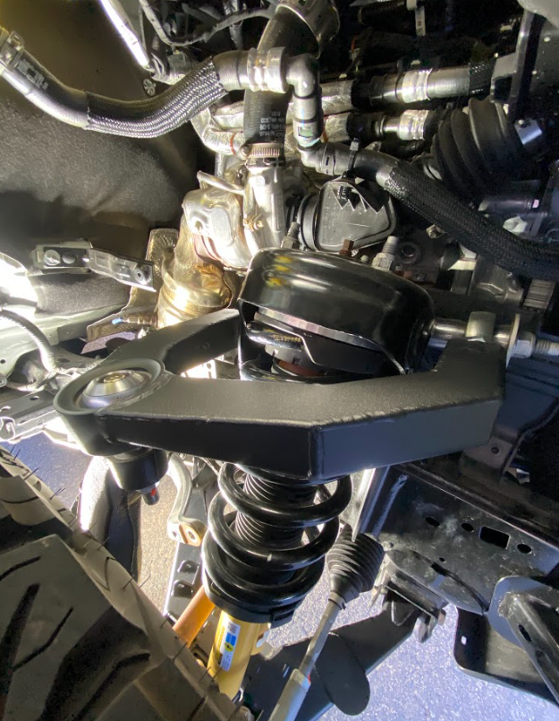 Fabricated upper arm kit for 2021 and newer Bronco, showcasing stock length design and suspension components.