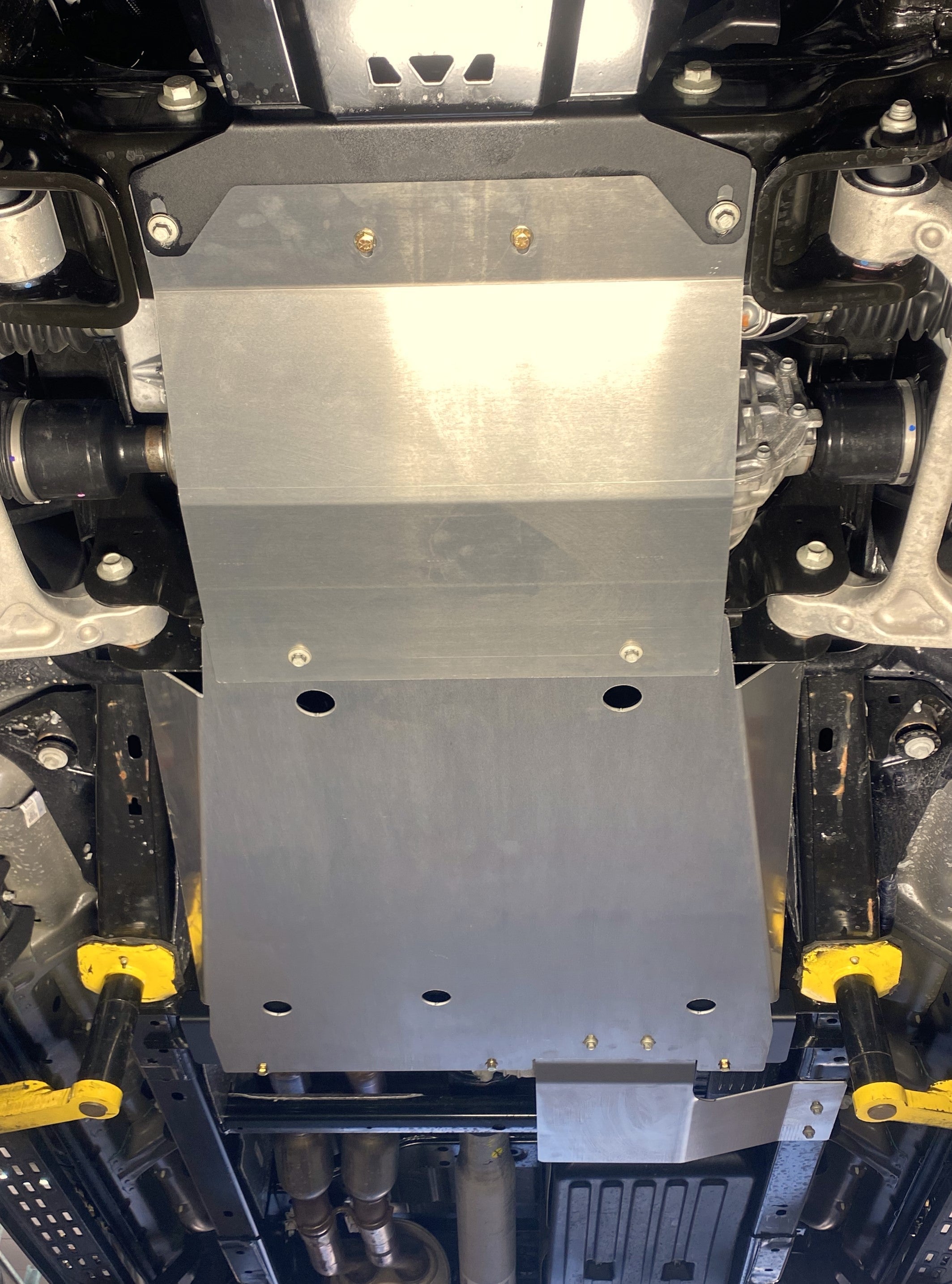 Skid plate kit for 2017-2024 Ford Raptor and Raptor-R, showcasing durable aluminum construction for underbody protection.
