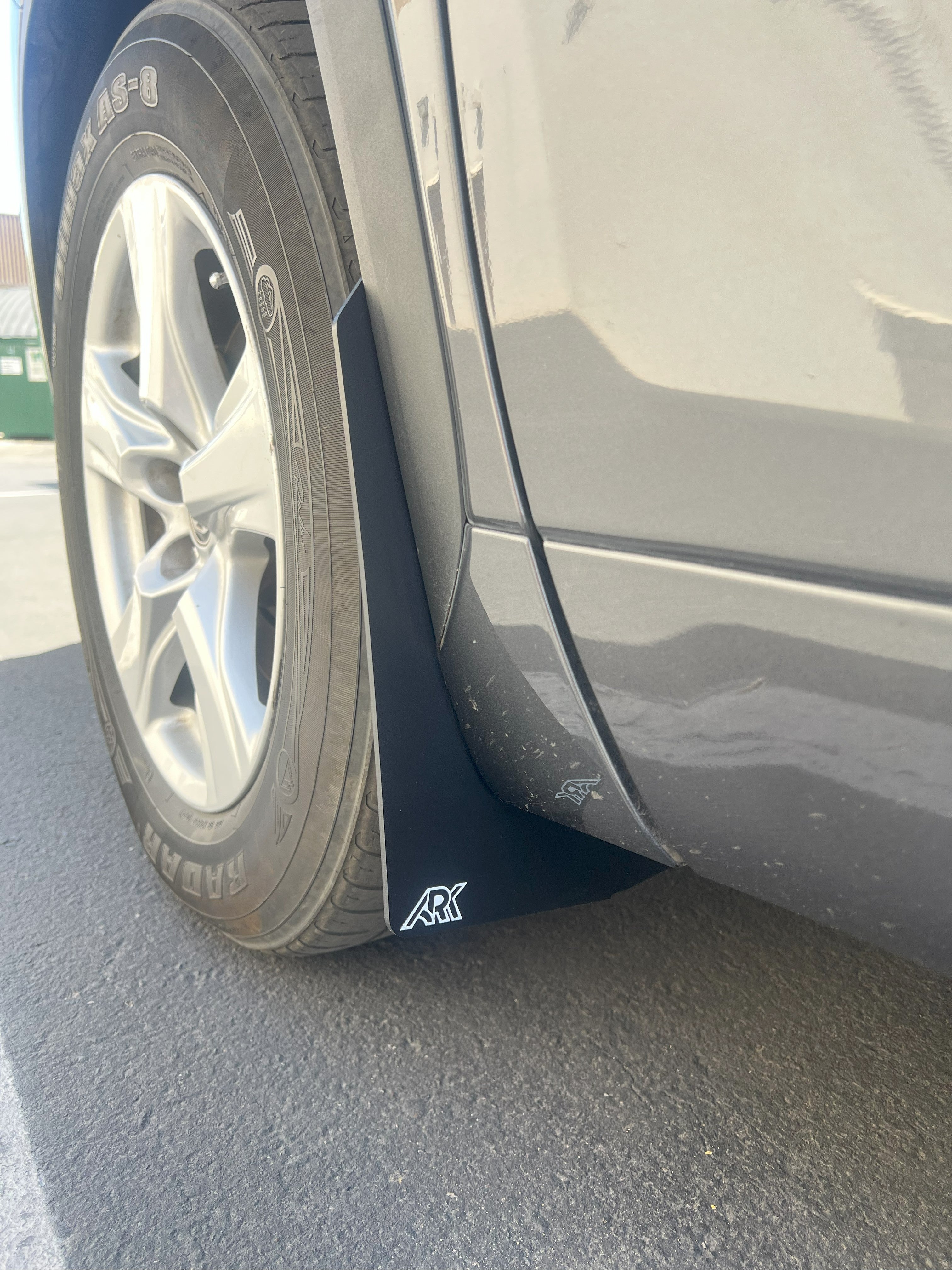 2020+ Toyota Highlander TriXPoly Mid Mudflaps installed on a vehicle, showcasing durability and protection against mud and debris.