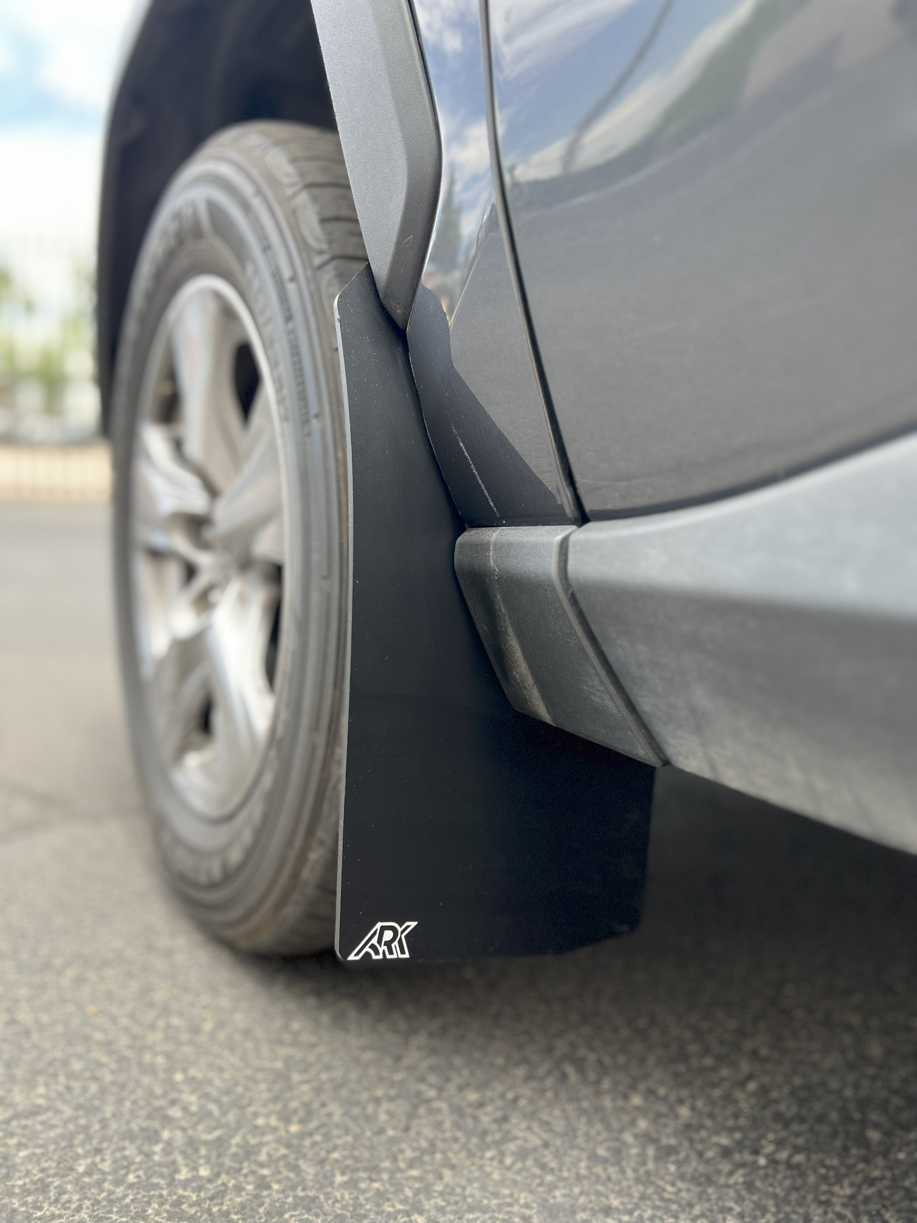 TriXPoly mudflaps for 2019-2025 Toyota RAV4 Gen 5, designed for durability and protection against mud and debris.