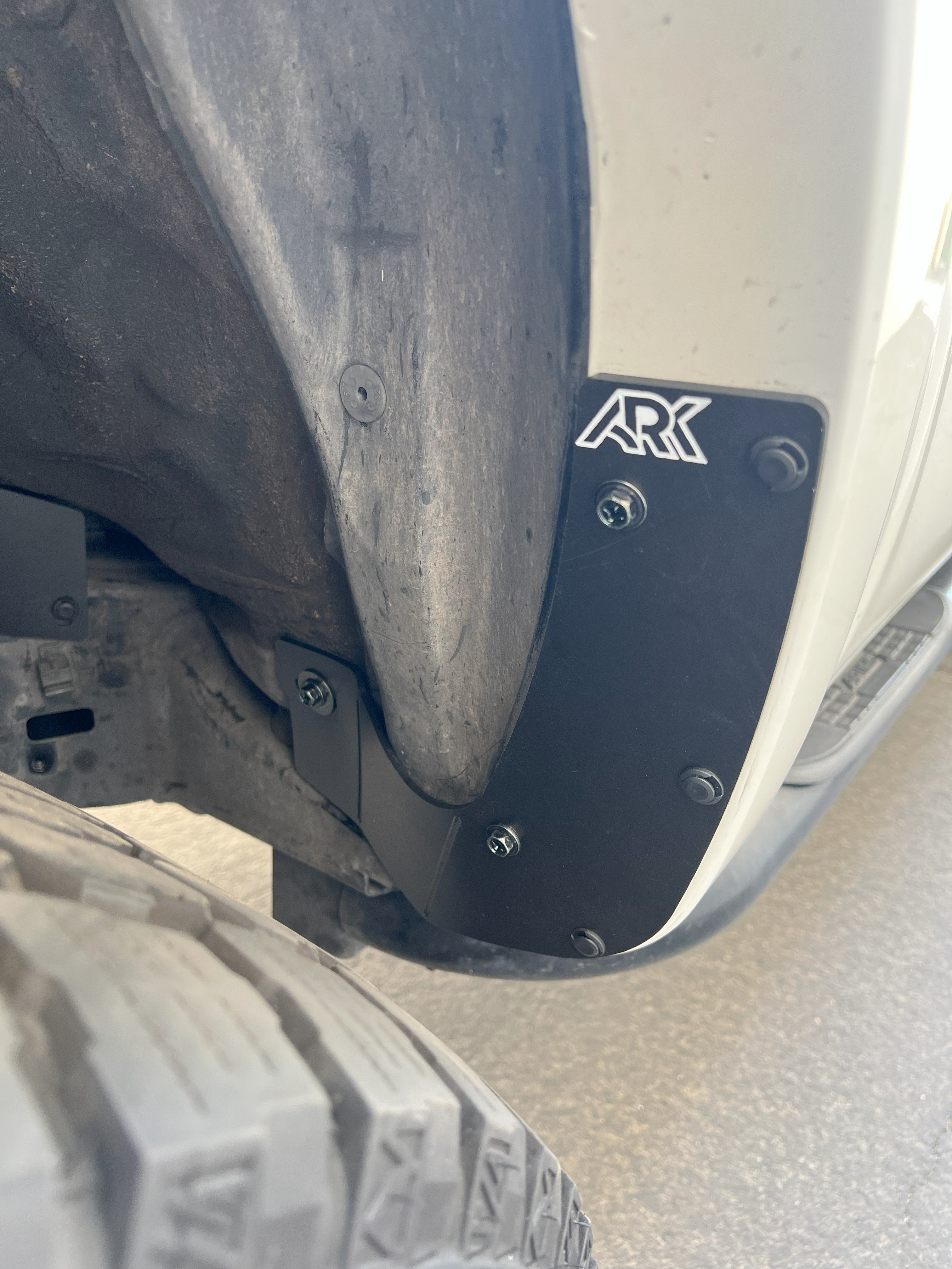 2006-2009 Toyota 4Runner TriXPoly Mud Flap Deletes installed, showcasing durable black material and secure fittings.