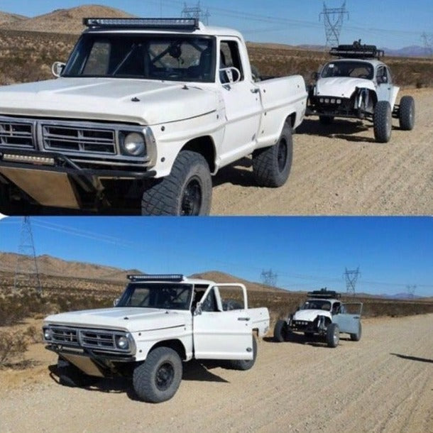 1967-1972 Ford F-100 frontend showcased on a rugged terrain with a trailer carrying a modified vehicle behind it.