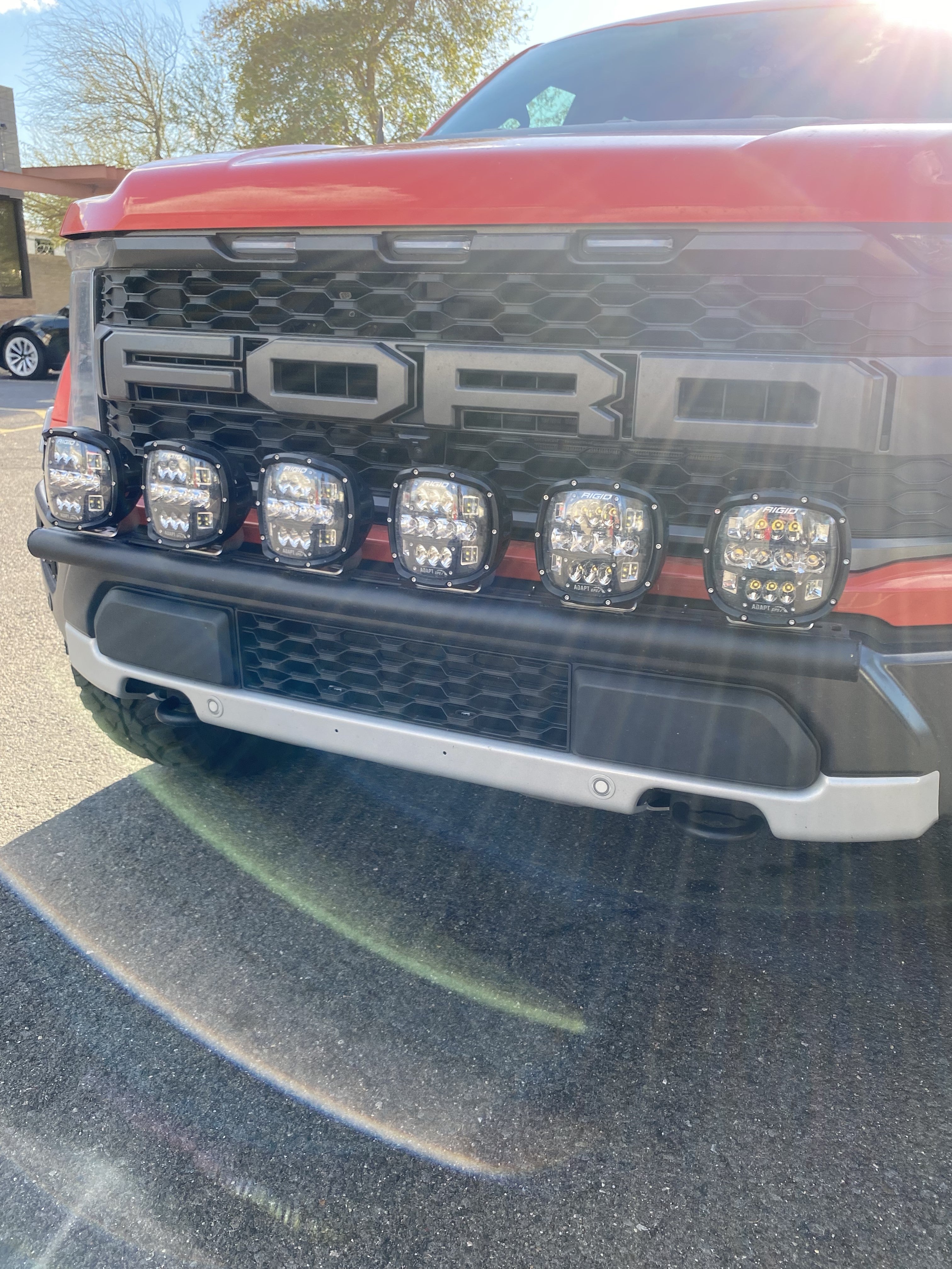 2024 Raptor front light mount kit installed on a truck, showcasing multiple lights on a modular bumper for versatile lighting options.