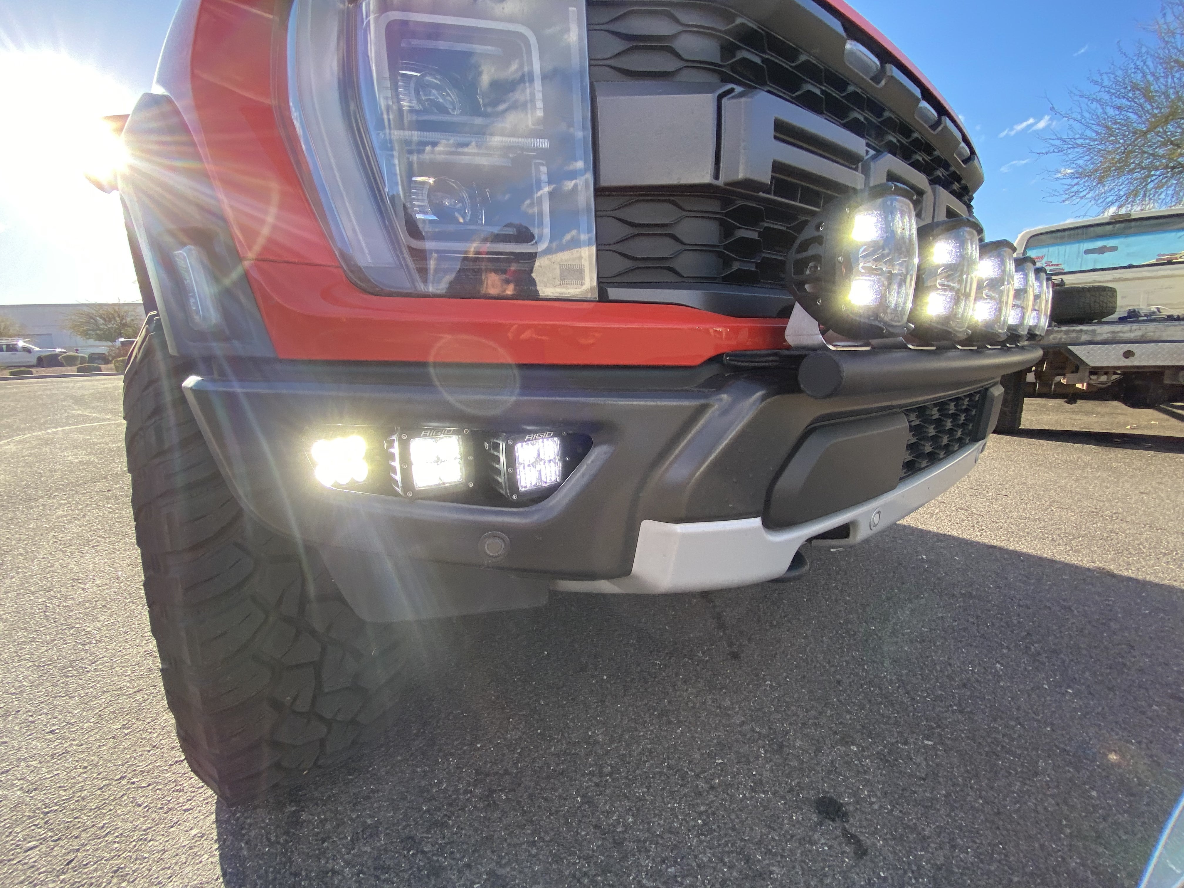 2024 Raptor Front Light Mount Kit on a modular bumper, showcasing versatile light options for enhanced visibility.