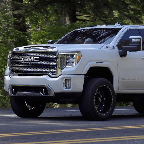 2020+ GM Sierra 2500/3500 front and rear fender flare caps designed for no-cut installation, enhancing truck style and protection.