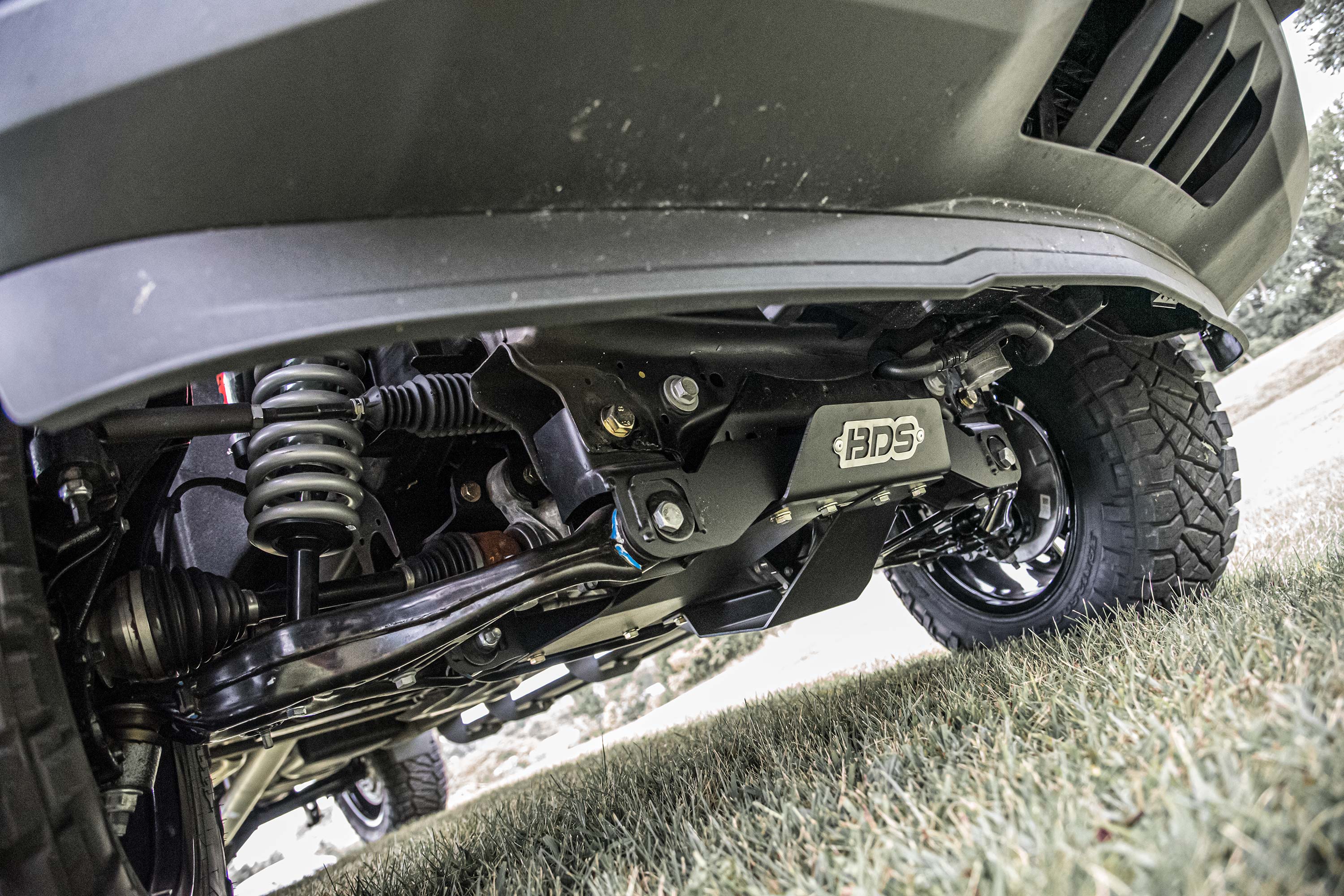 6 inch lift kit for Chevy Silverado or GMC Sierra 1500 4WD, showcasing suspension components and undercarriage design.