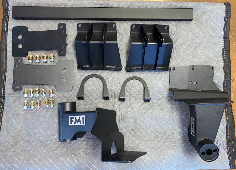 2010-2014 Ford Raptor bump stop kit by Foutz Motorsports featuring various components for enhanced offroad performance.