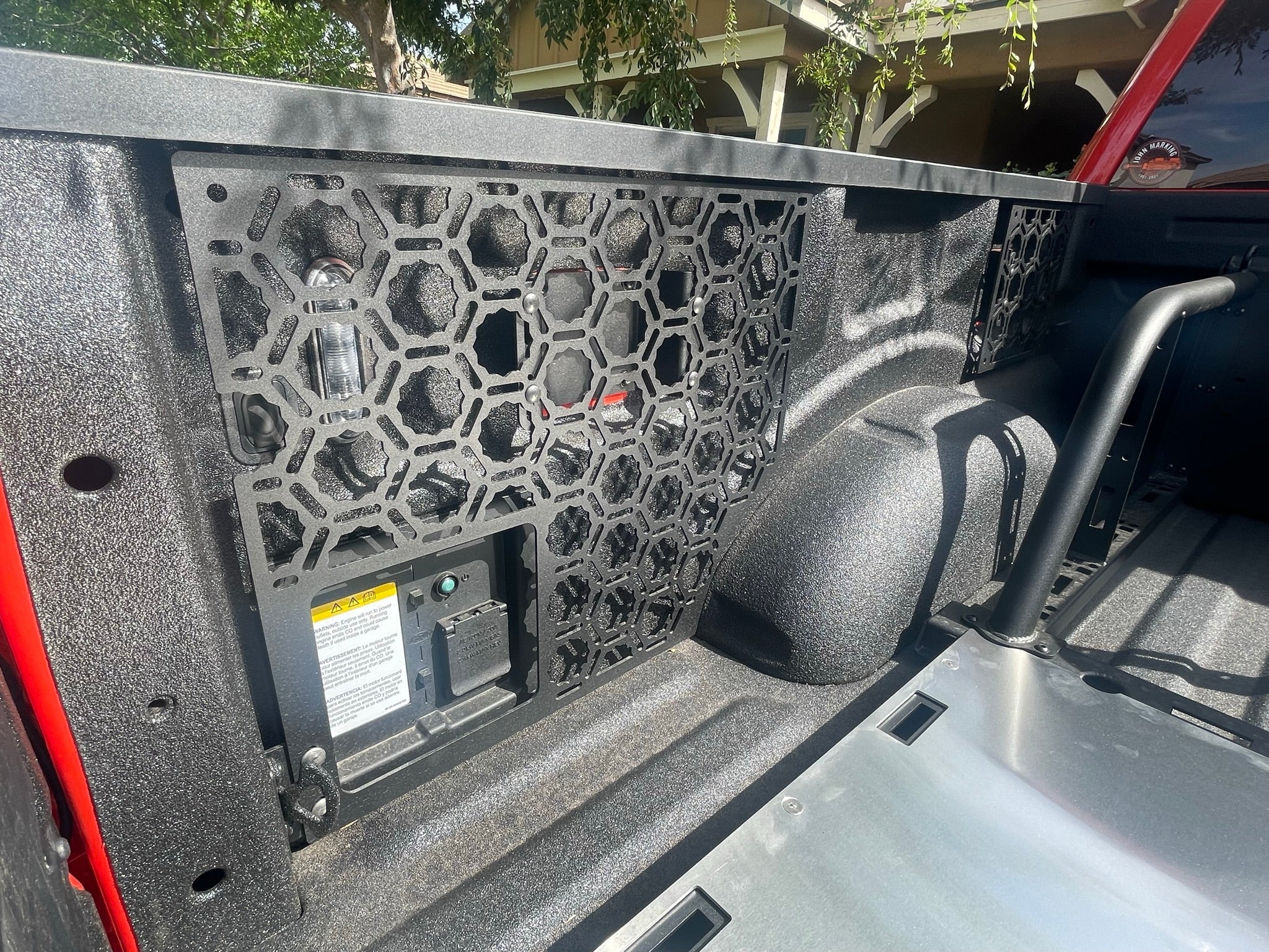 Bedside organizer panel kit for 2021-2023 Ford Raptor and F150, designed for efficient storage and easy access in the truck bed.