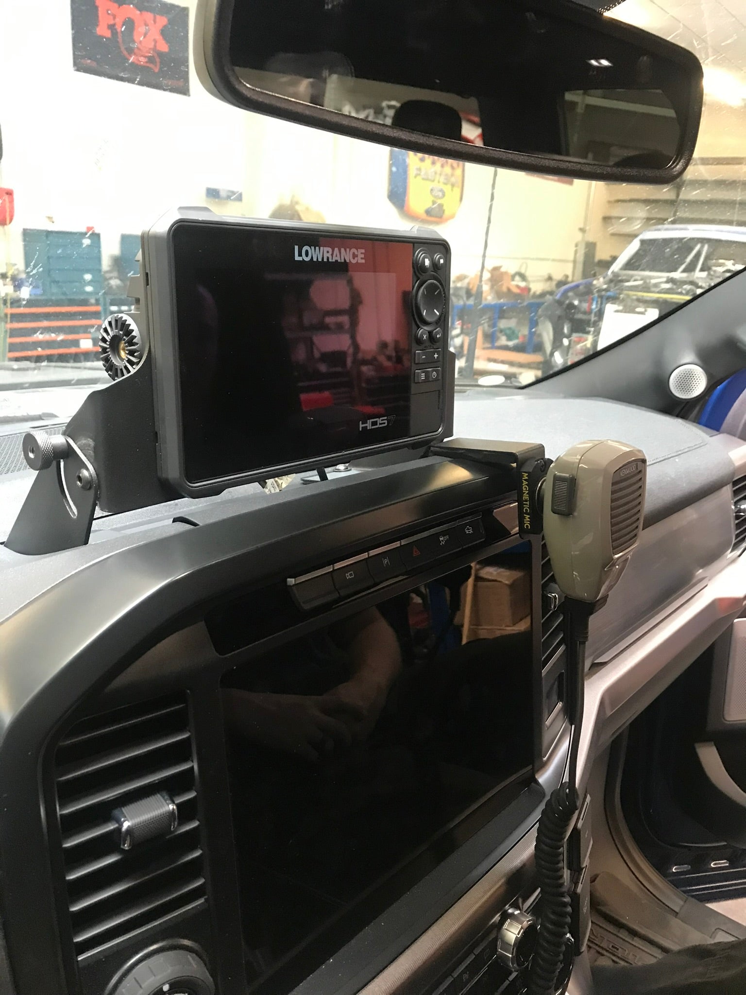 2021-2024 F150 and Gen 3 Raptor center dash GPS mount for HDS7 Live, showcasing a sleek installation with a radio mic.